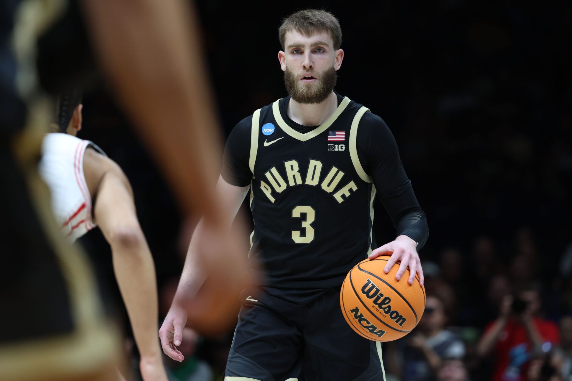 Purdue Boilermakers guard Braden Smith (3) dribbles the ball against the Houston Cougars in the first half during a Midwest Regional semifinal of the 2025 NCAA tournament at Lucas Oil Stadium.