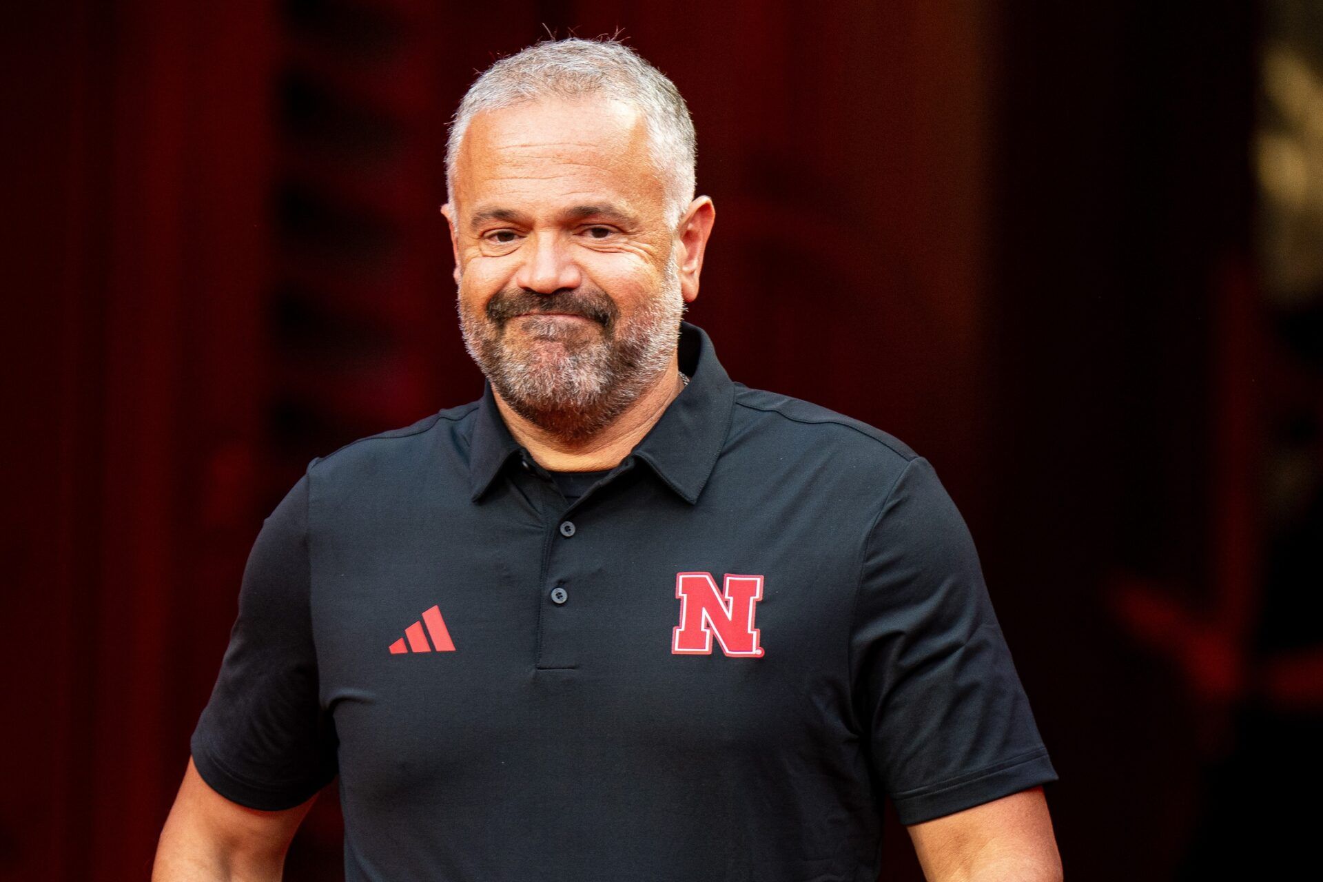 Nebraska Cornhuskers head coach Matt Rhule walks onto the field during warmups before the game against the Cincinnati Bearcats at GEHA Field at Arrowhead Stadium.