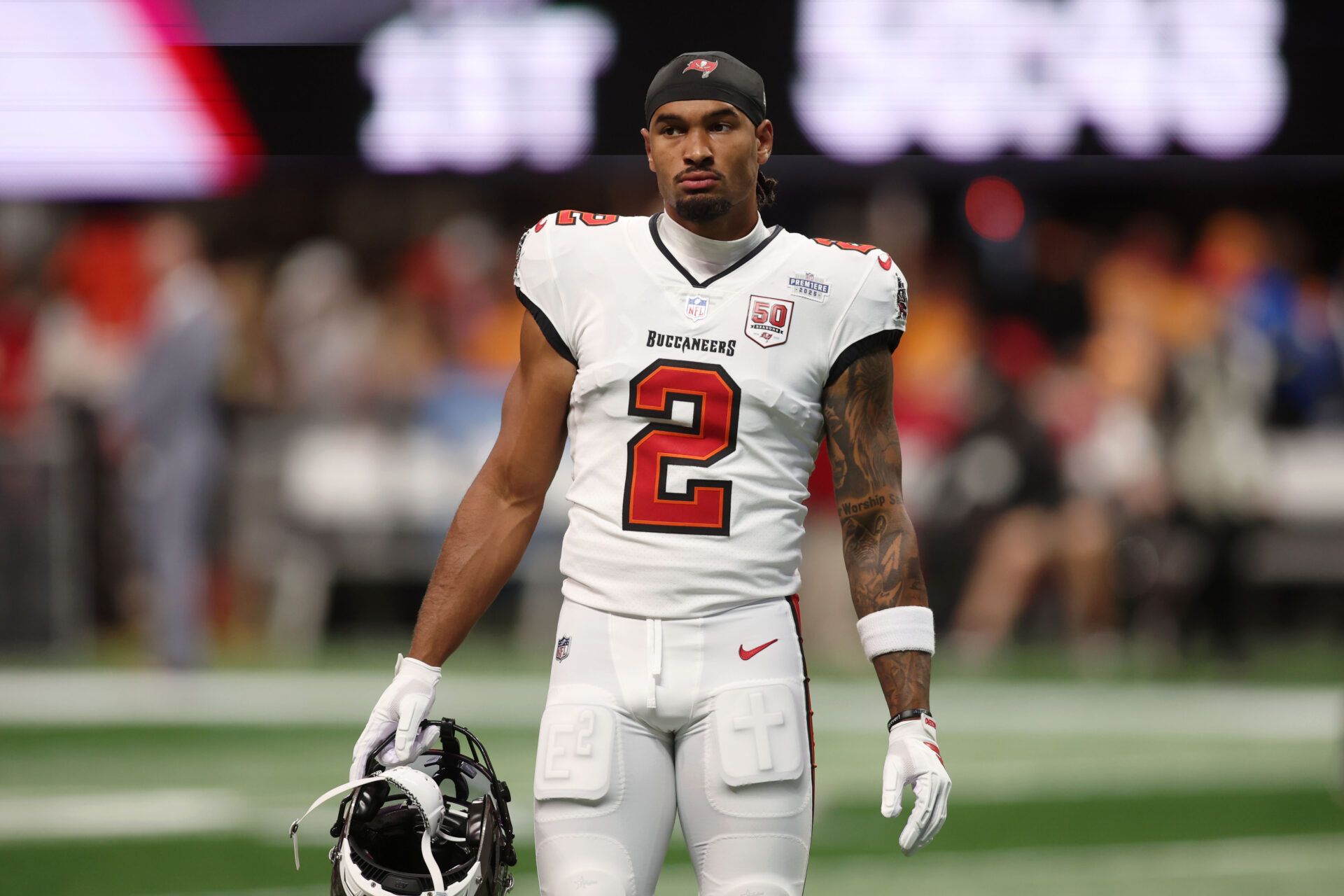 Tampa Bay Buccaneers wide receiver Emeka Egbuka (2) looks on before the game against the Atlanta Falcons at Mercedes-Benz Stadium.