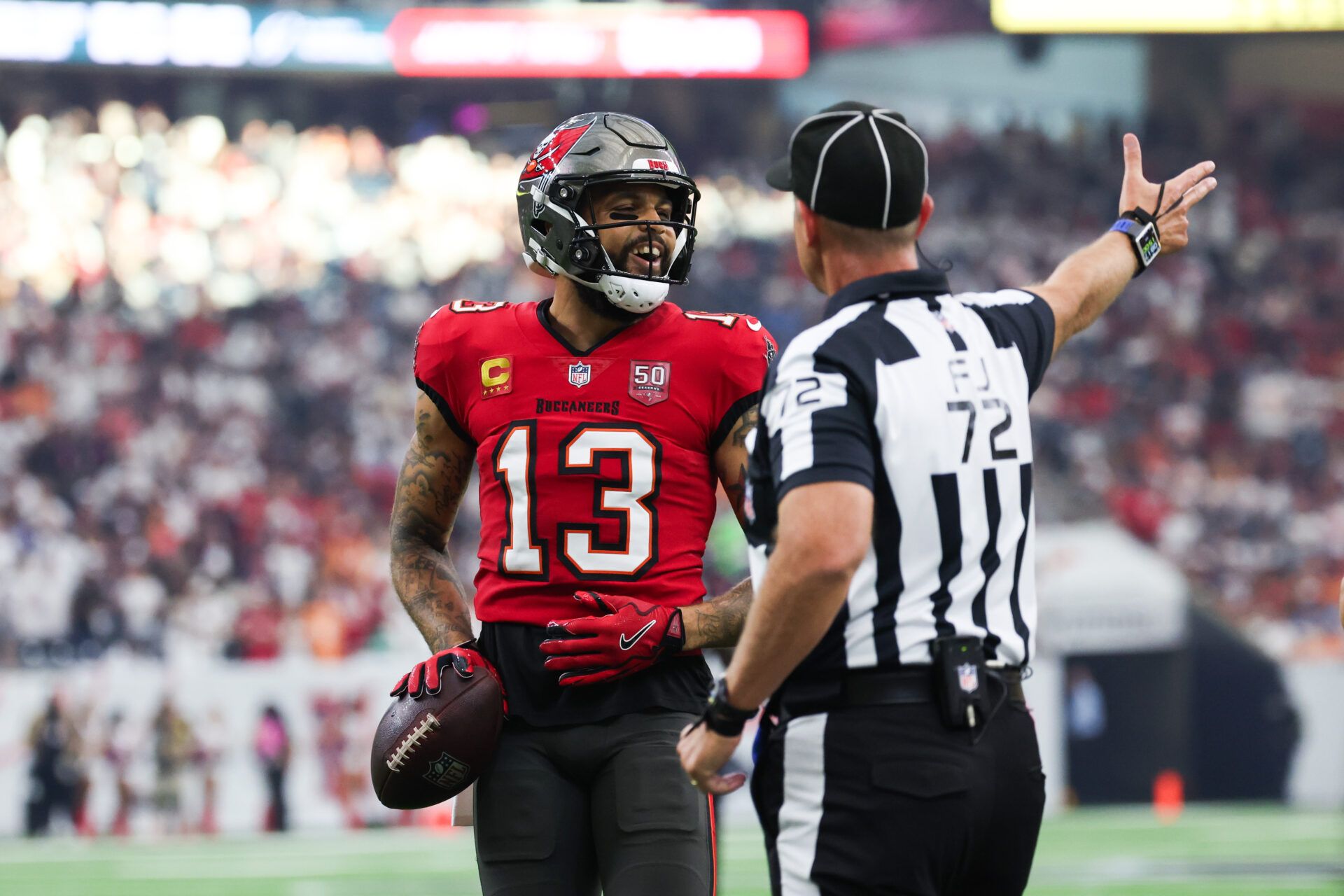 Tampa Bay Buccaneers wide receiver Mike Evans (13) reacts after a penalty call during the first quarter against the Houston Texans at NRG Stadium.
