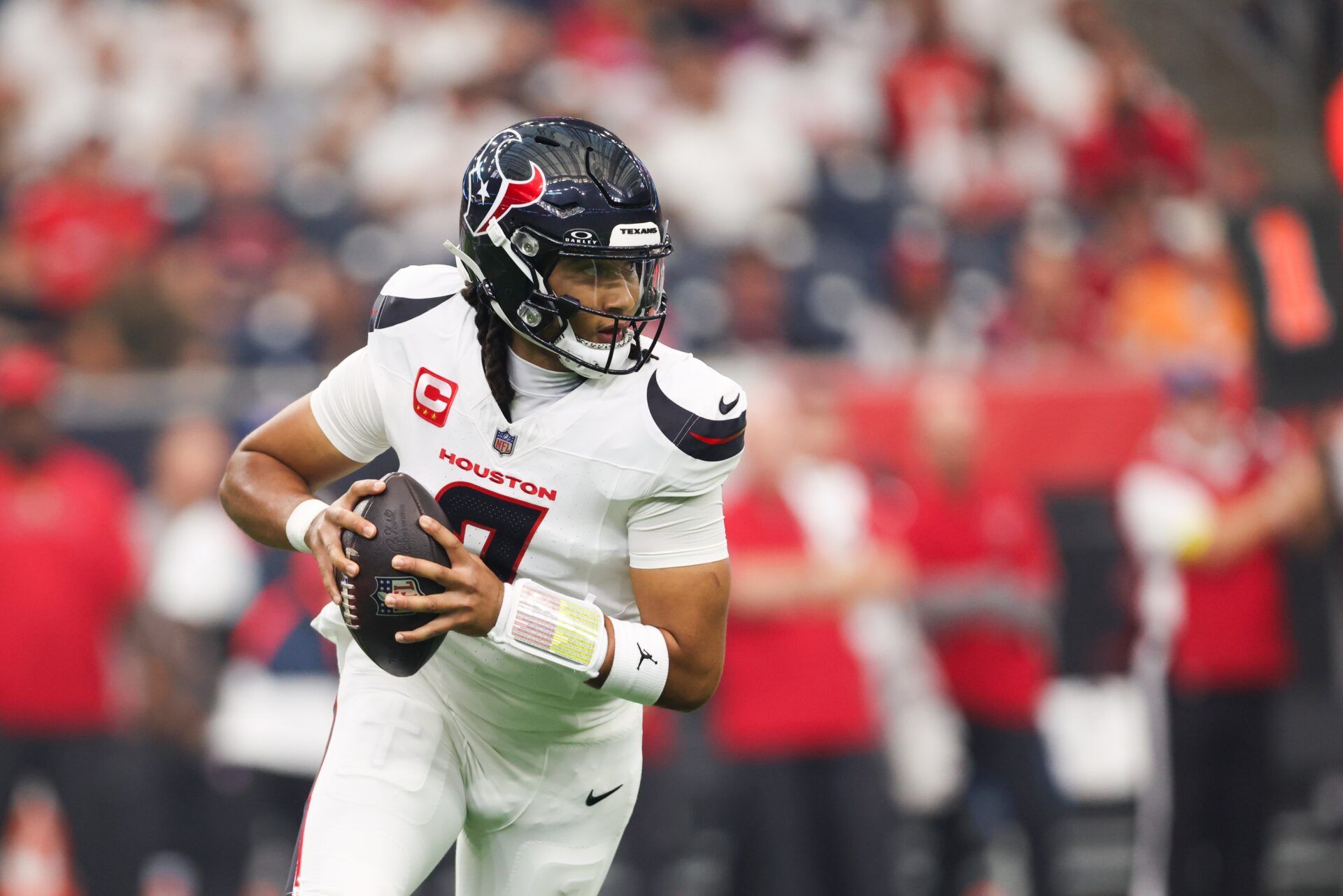 Houston Texans quarterback C.J. Stroud (7) drops back to pass during the first quarter against the Tampa Bay Buccaneers at NRG Stadium.