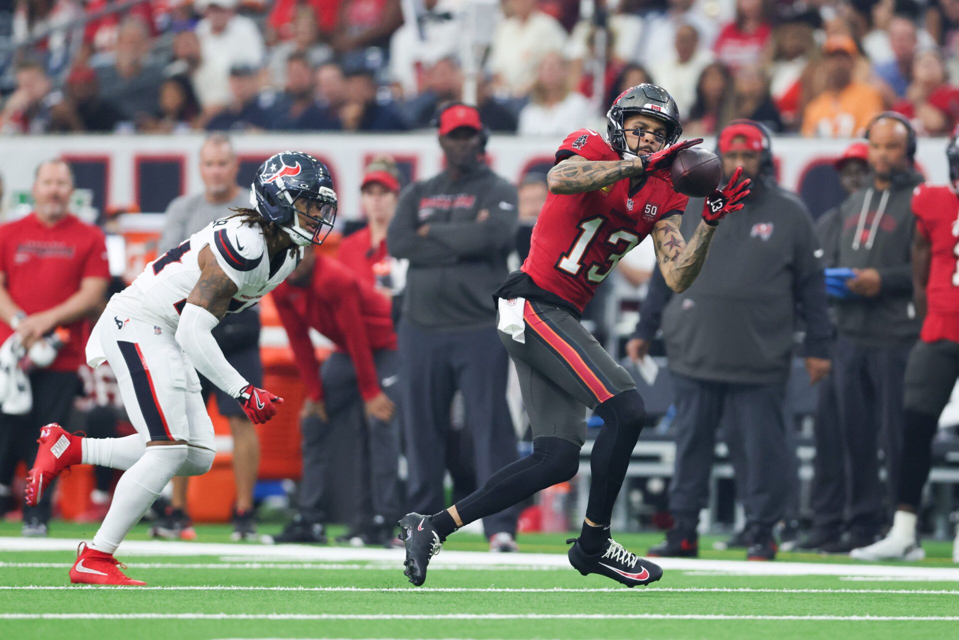 Tampa Bay Buccaneers wide receiver Mike Evans (13) makes a catch during the first quarter against the Houston Texans at NRG Stadium.