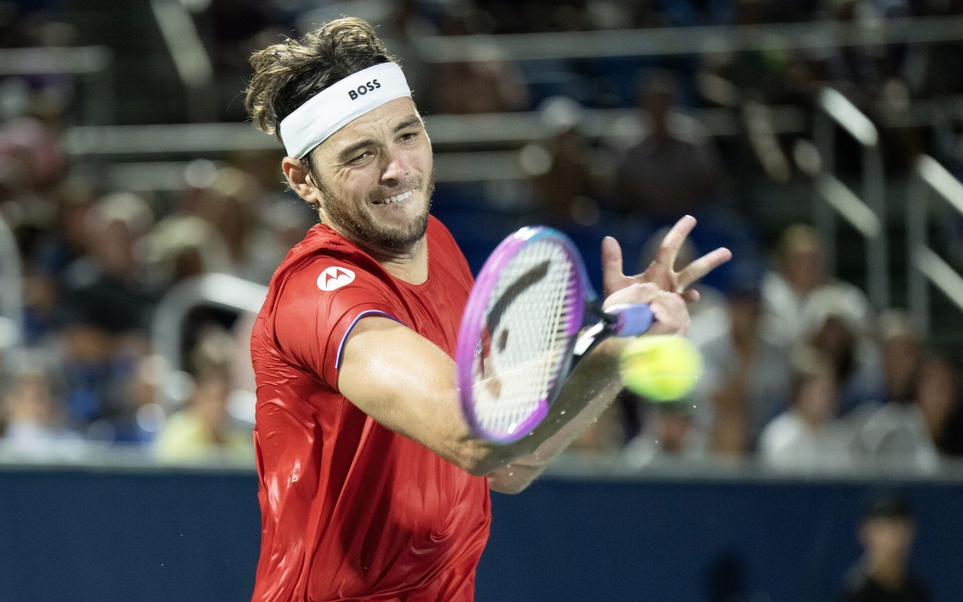 Taylor Fritz of the United States returns a shot against Jakub Mensik of Czechia in the second rubber of the Davis Cup tie between the USA and Czechia at Delray Beach Tennis Center.