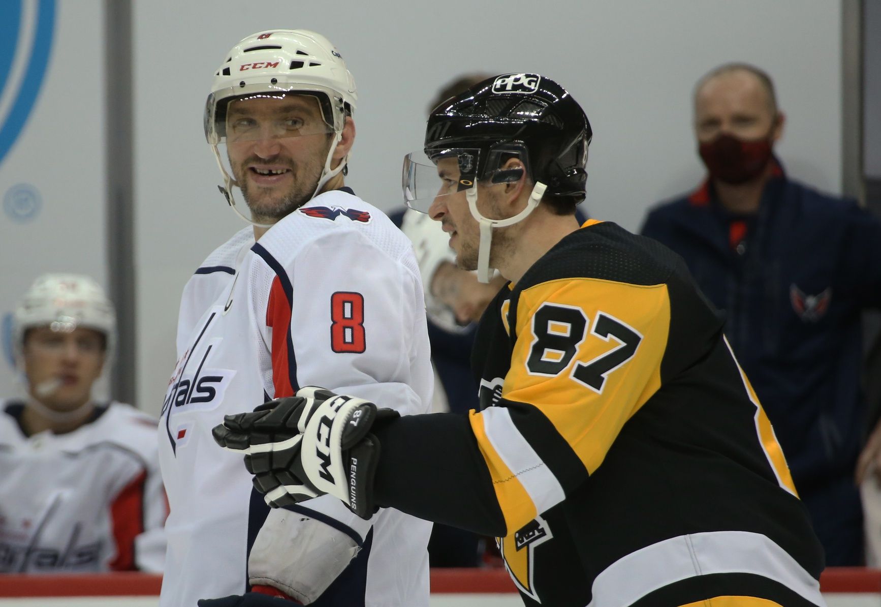 Washington Capitals left wing Alex Ovechkin (8) reacts as he talks with Pittsburgh Penguins center Sidney Crosby (87) during the second period at the PPG Paints Arena. Pittsburgh won 4-3 in overtime.