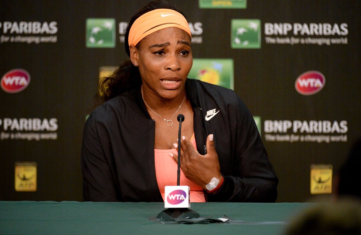 Serena Williams (USA) talks to the media after she withdrew from the BNP Paribas Open due to a knee injury. The tournament is held at the Indian Wells Tennis Garden.