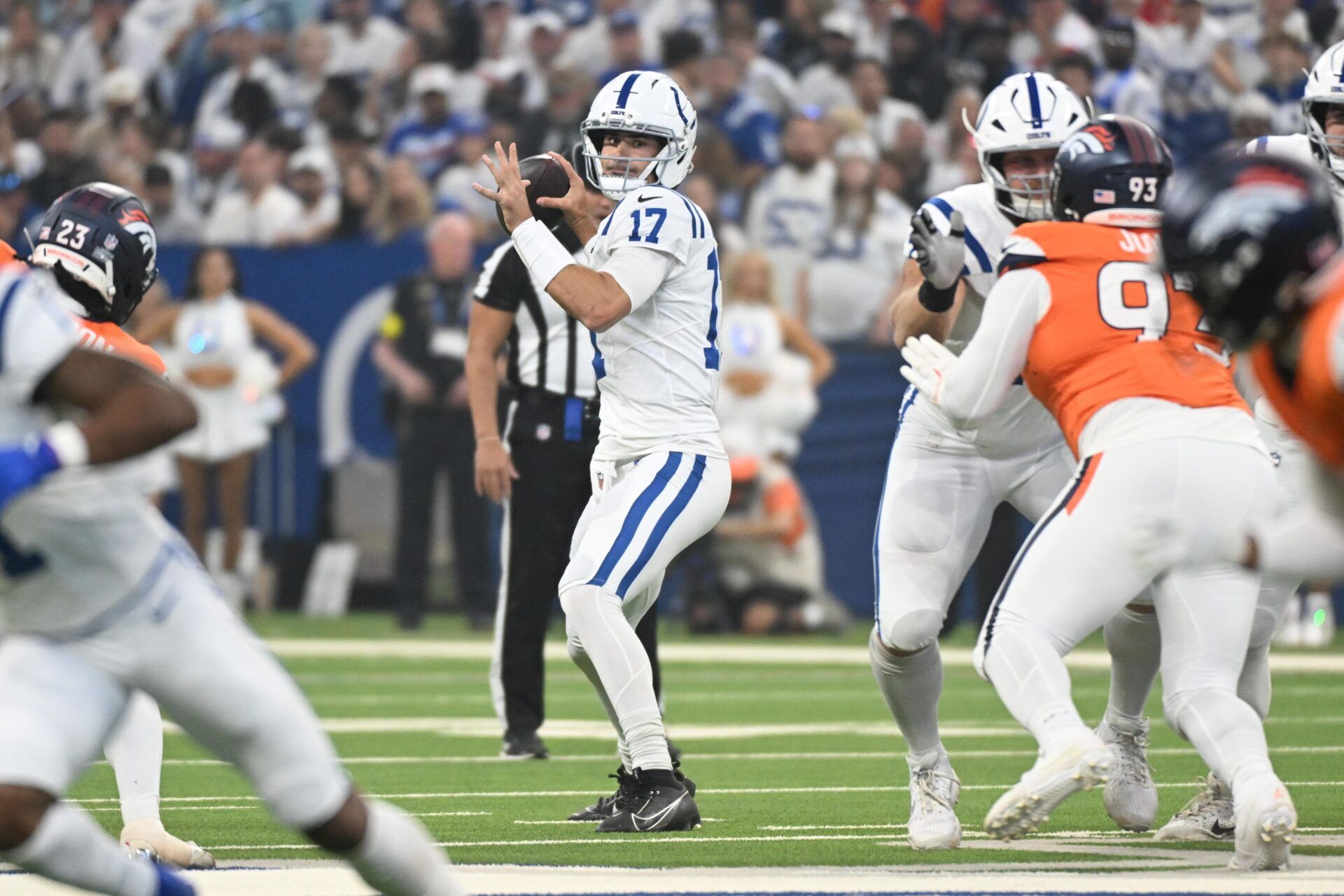 Indianapolis Colts quarterback Daniel Jones (17) looks to pass the ball during the first quarter against the Denver Broncos at Lucas Oil Stadium.