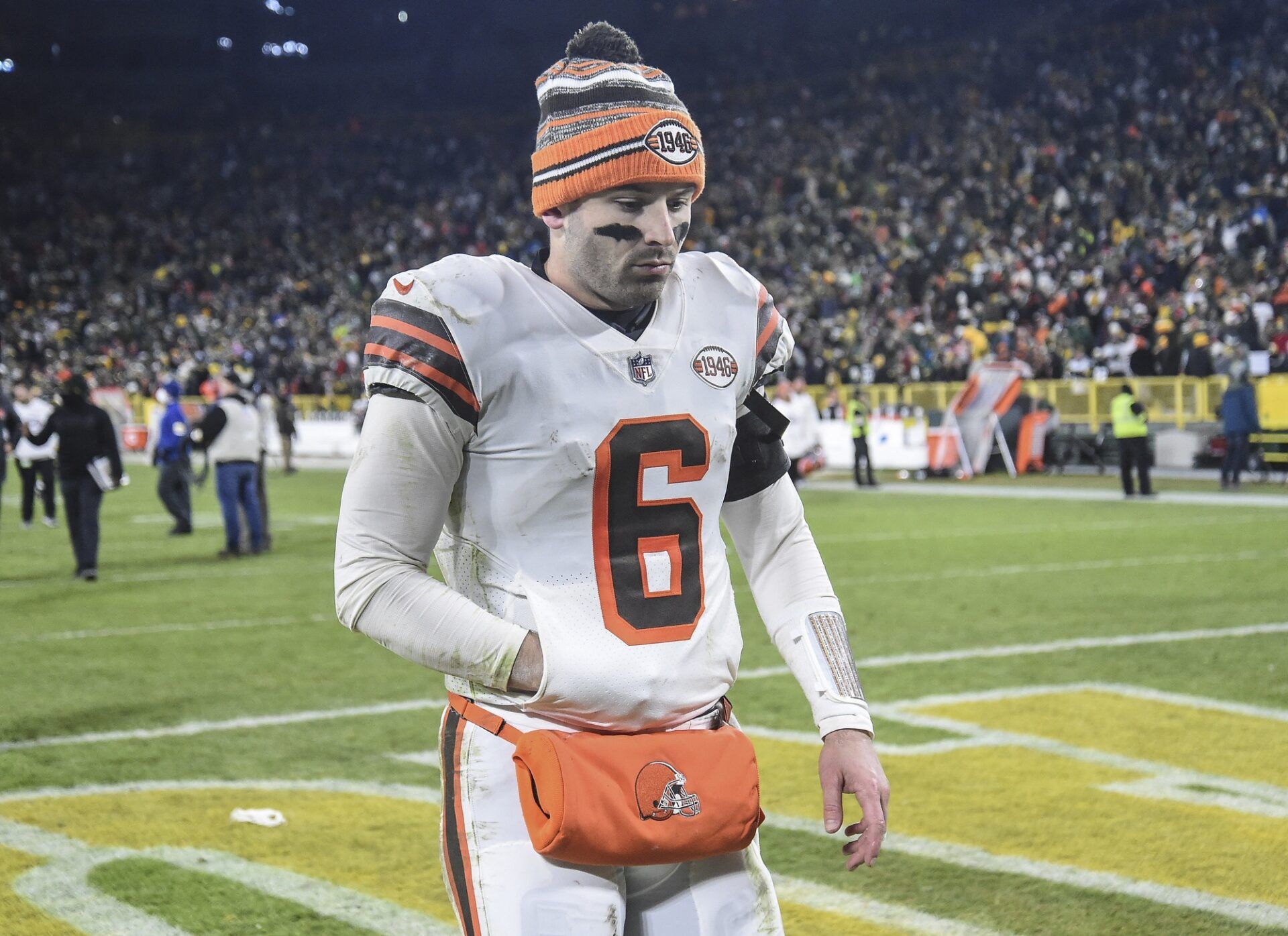 Cleveland Browns quarterback Baker Mayfield (6) walks off the field after the Browns lost to the Green Bay Packers at Lambeau Field.