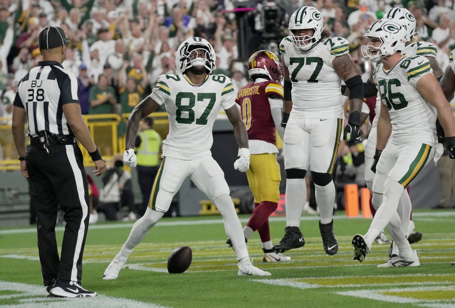 Green Bay Packers wide receiver Romeo Doubs (87) celebrates his touchdown catch during the first quarter of their game against the Washington Commanders Thursday, September 11, 2025 at Lambeau Field in Green Bay, Wisconsin.