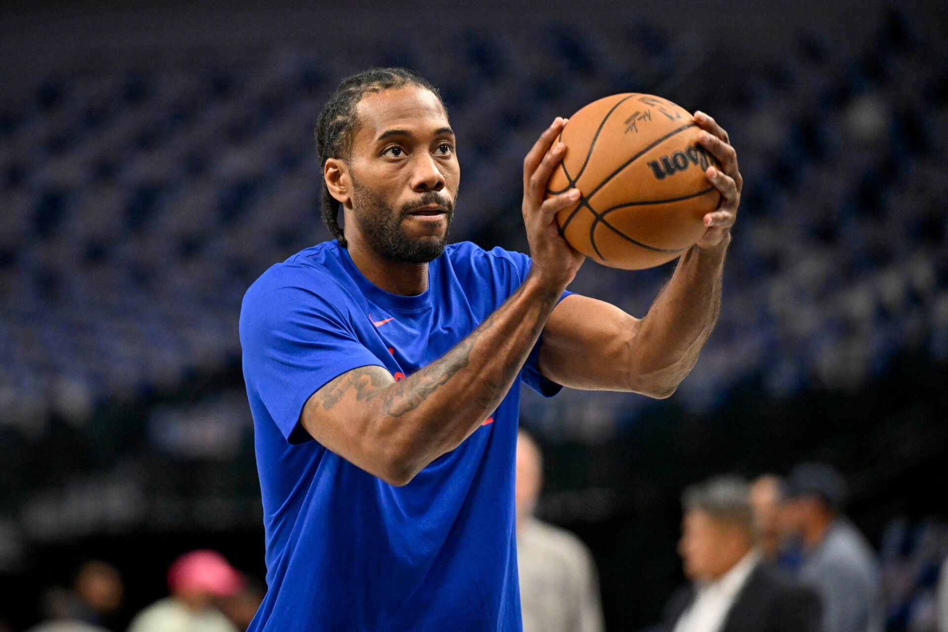 LA Clippers forward Kawhi Leonard (2) warms up before the game between the Dallas Mavericks and the LA Clippers during game three of the first round for the 2024 NBA playoffs at the American Airlines Center.