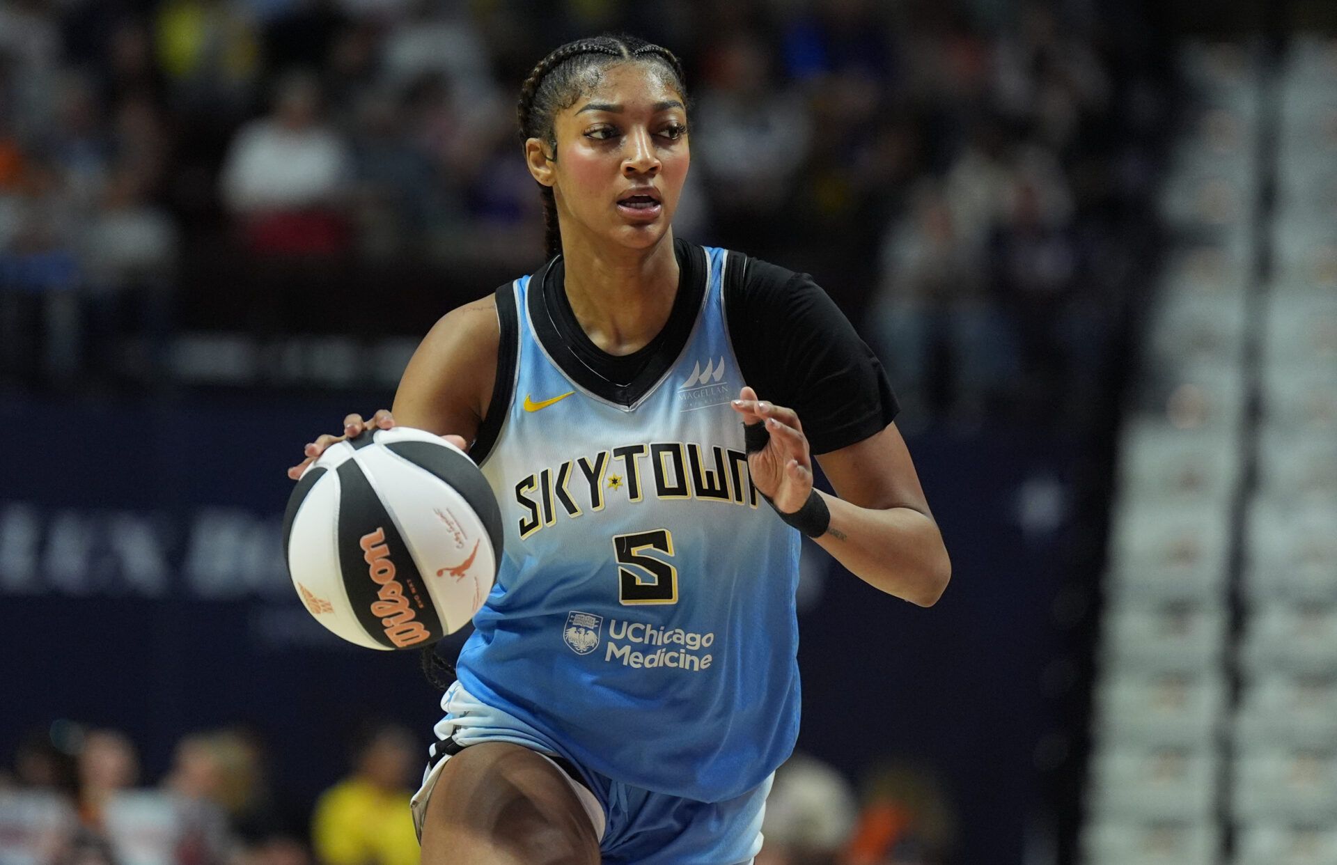 Chicago Sky forward Angel Reese (5) returns the ball against the Connecticut Sun in the first half at Mohegan Sun Arena.