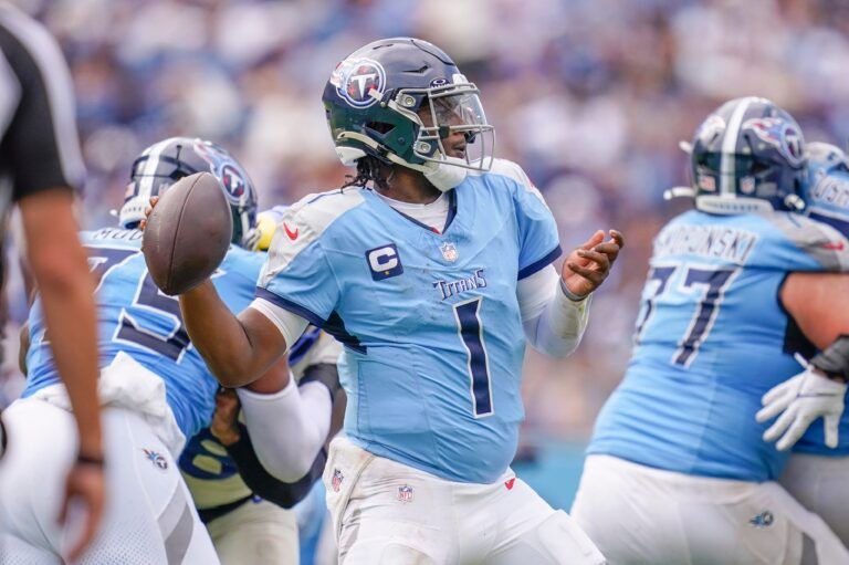 Tennessee Titans quarterback Cam Ward (1) winds up to throw against the Los Angeles Rams during the third quarter at Nissan Stadium in Nashville, Tenn., Sunday, Sept. 14, 2025.