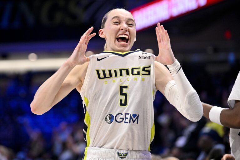 Dallas Wings guard Paige Bueckers (5) celebrates after the game against the Phoenix Mercury at College Park Center.