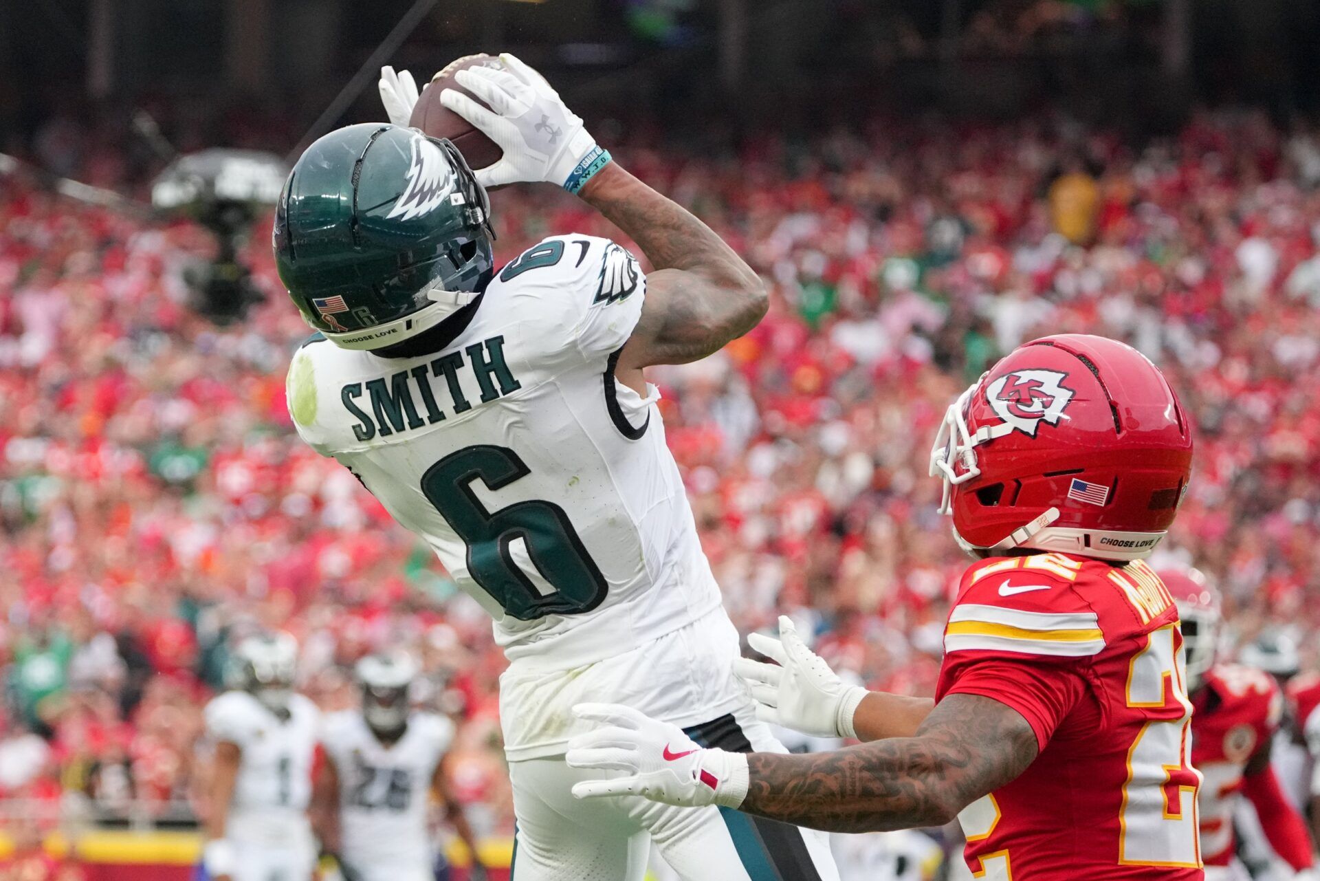 Philadelphia Eagles wide receiver DeVonta Smith (6) makes a reception defended by Kansas City Chiefs cornerback Trent McDuffie (22) during the fourth quarterof the game at GEHA Field at Arrowhead Stadium.