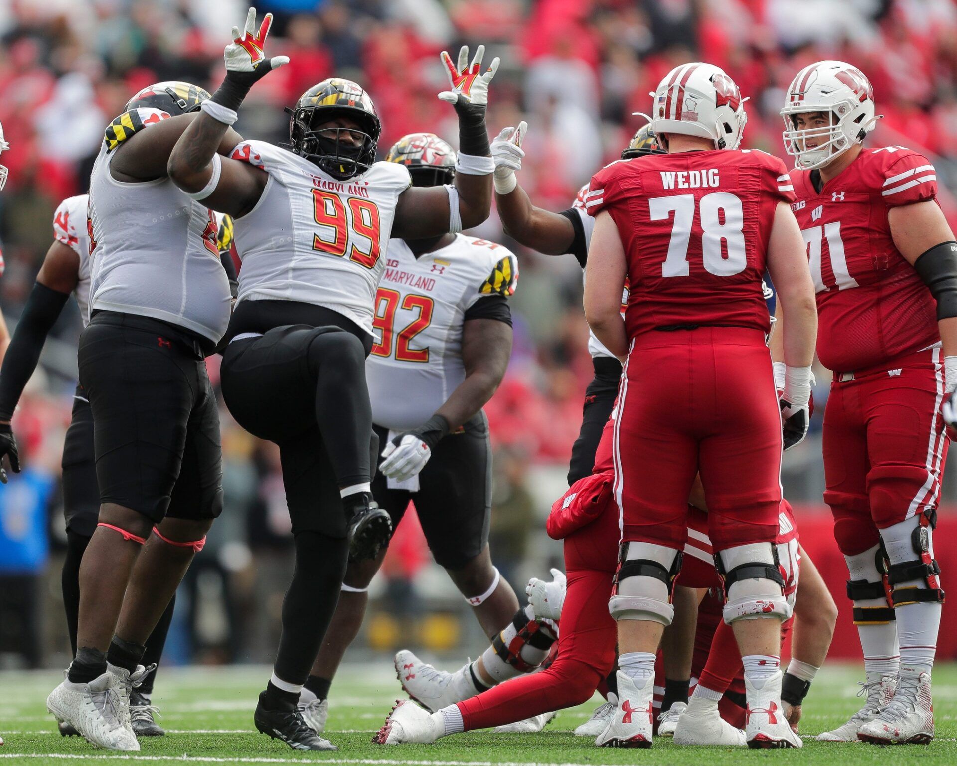 Maryland defensive lineman Tommy Akingbesote (99) celebrates after sacking Wisconsin quarterback Graham Mertz on Saturday, November 5, 2022, at Camp Randall Stadium in Madison, Wis. Wisconsin won the game, 23-10.Tork Mason/USA TODAY NETWORK-Wisconsin

Usat Wisconsin Vs Maryland Football 110522 2708 Ttm