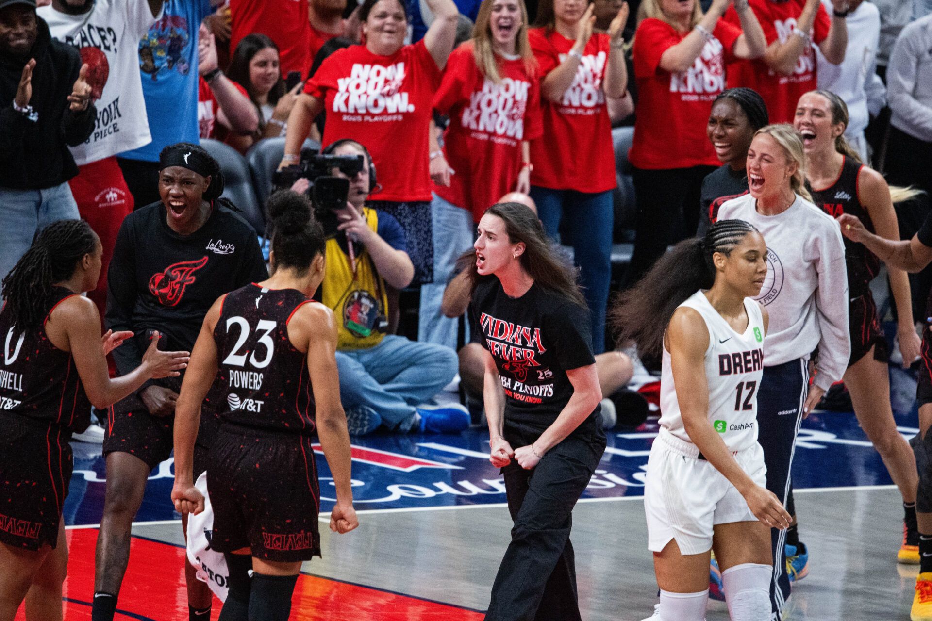 Indiana Fever guard Caitlin Clark (22) celebrates a basket during game two of round one against the Atlanta Dream for the 2025 WNBA Playoffs at Gainbridge Fieldhouse.