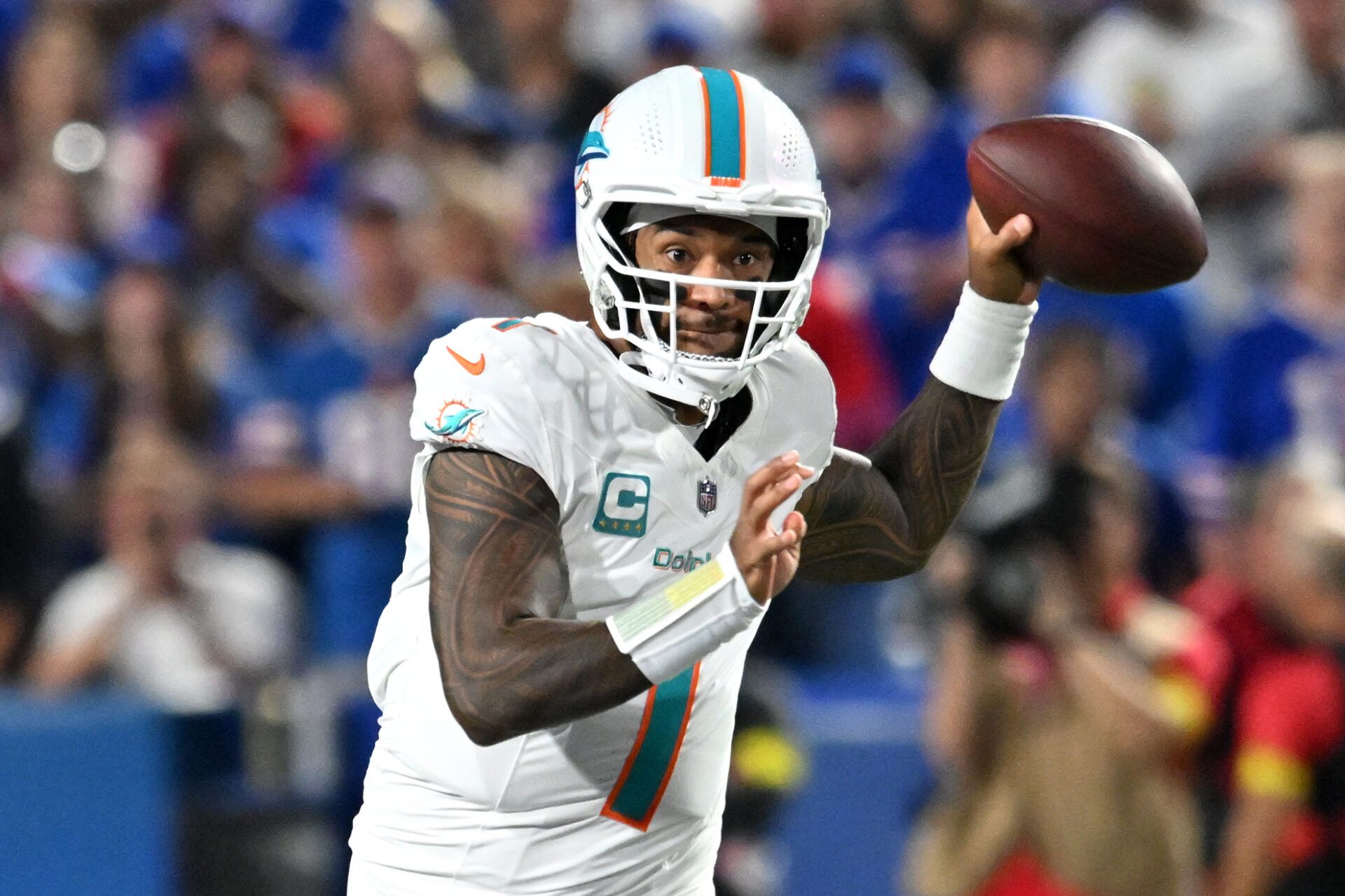 Miami Dolphins quarterback Tua Tagovailoa (1) passes against the Buffalo Bills in the first quarter at Highmark Stadium.