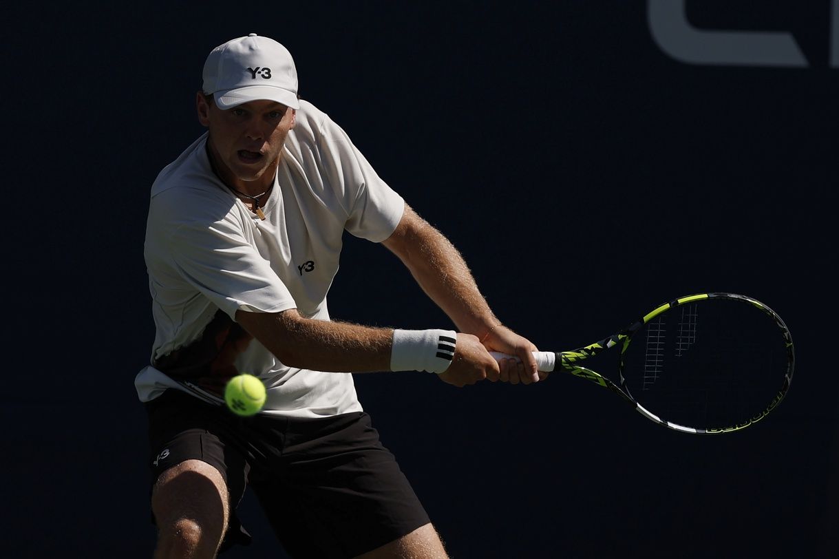 Alex Michelsen (USA) hits the ball to Francisco Comesana (ARG)(not pictured) on day two of the 2025 U.S. Open tennis tournament at the USTA Billie Jean King National Tennis Center.