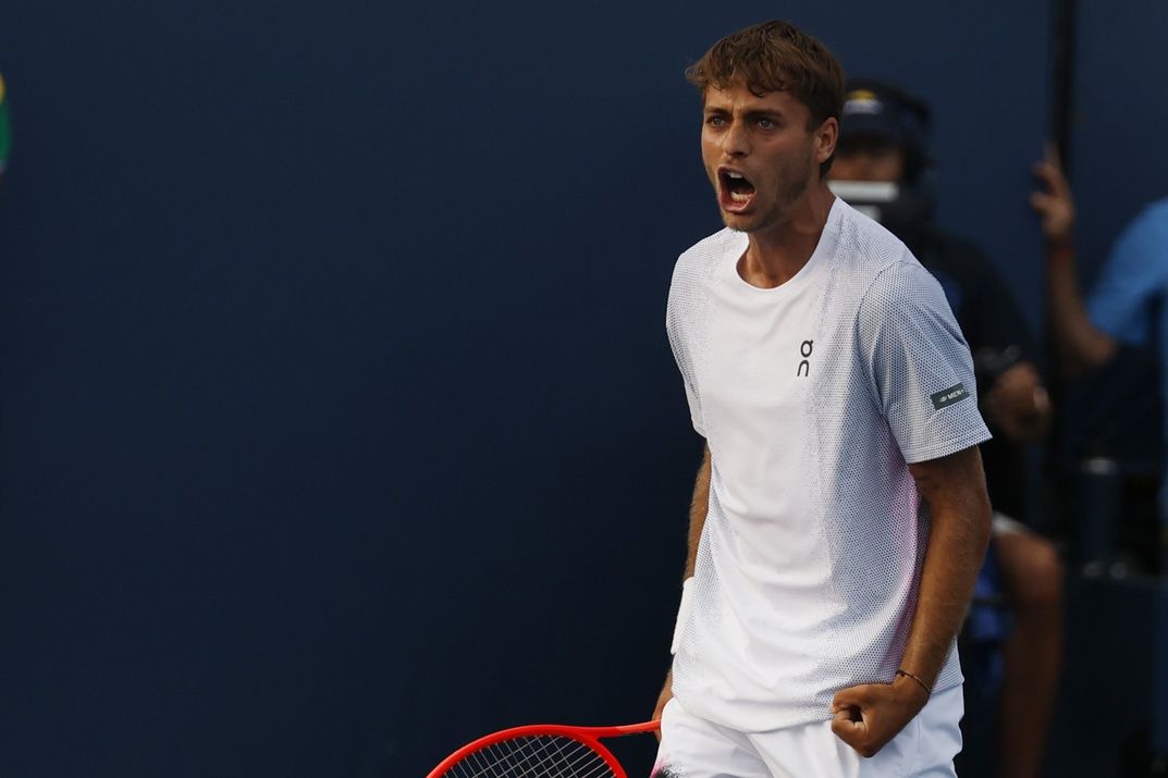 Flavio Cobolli (ITA) celebrates after match point against Francesco Passaro (ITA)(not pictured) on day two of the 2025 US Open tennis tournament at USTA Billie Jean King National Tennis Center.