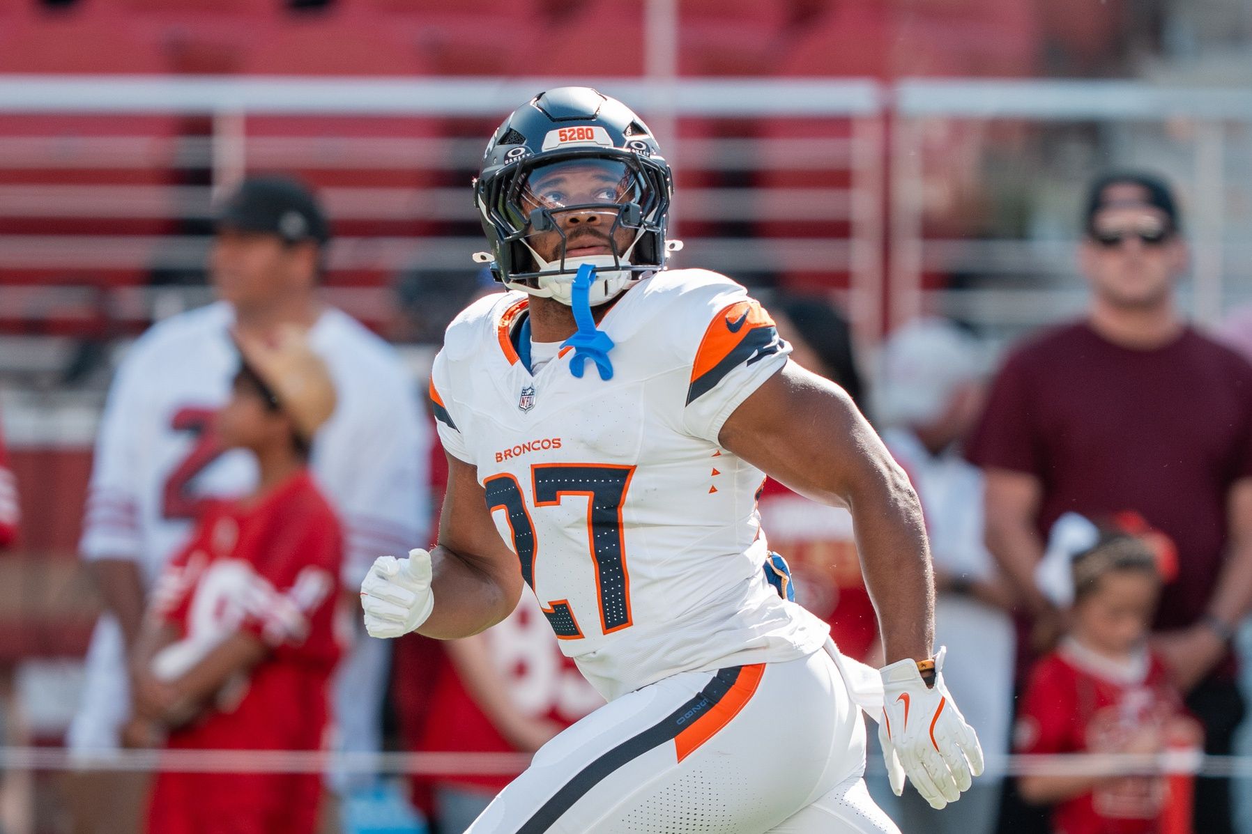 Denver Broncos running back J.K. Dobbins (27) warms up before the game against the San Francisco 49ers at Levi's Stadium.