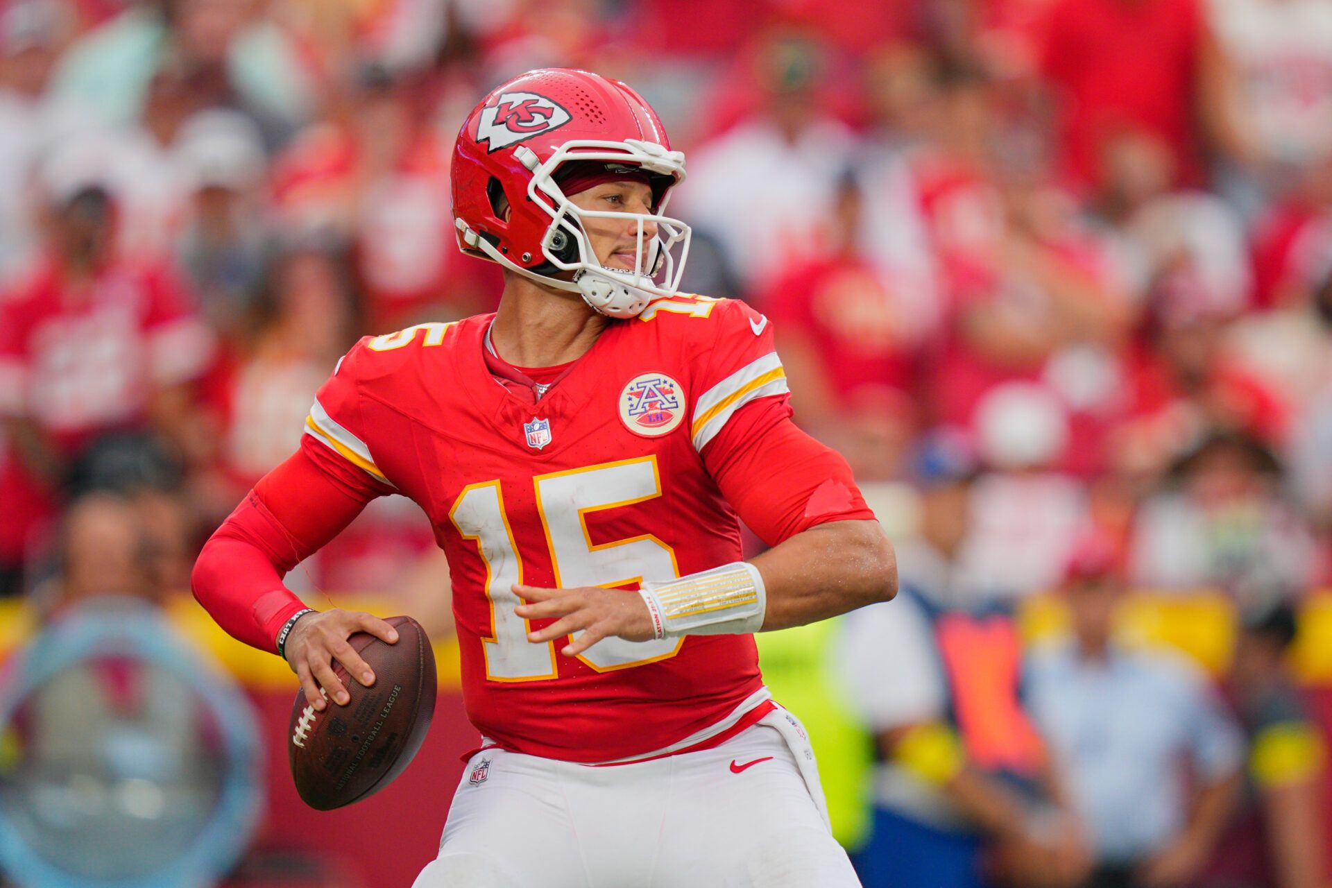 Kansas City Chiefs quarterback Patrick Mahomes (15) passes the ball against the Philadelphia Eagles during the fourth quarter of the game at GEHA Field at Arrowhead Stadium.