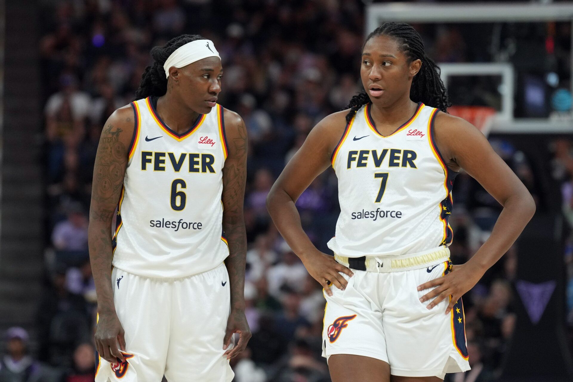 Indiana Fever forwards Natasha Howard (6) and Aliyah Boston (7) stand on the court during the third quarter against the Golden State Valkyries at Chase Center.