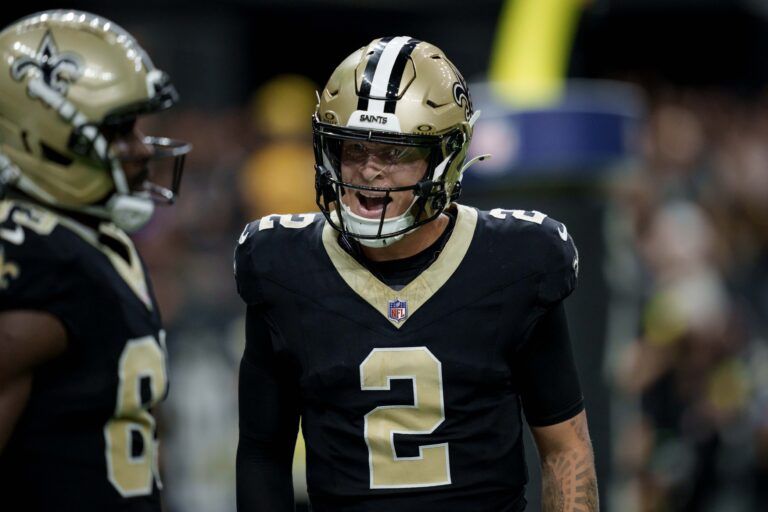 New Orleans Saints quarterback Spencer Rattler (2) reacts after a touchdown reception by tight end Juwan Johnson (not shown) during the first half against the San Francisco 49ers at Caesars Superdome.