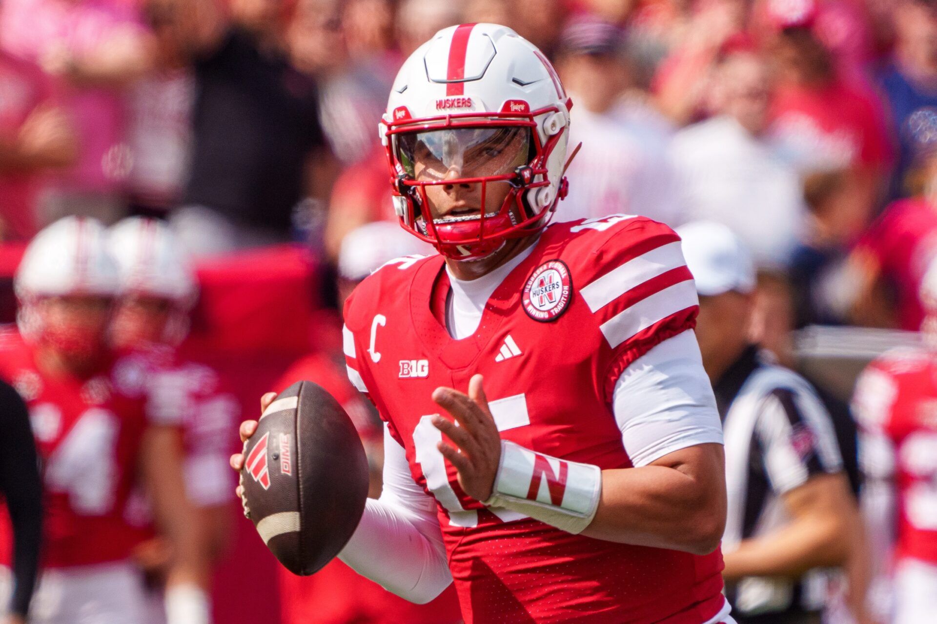 Nebraska Cornhuskers quarterback Dylan Raiola (15) looks to pass against the Michigan Wolverines during the first quarter at Memorial Stadium.