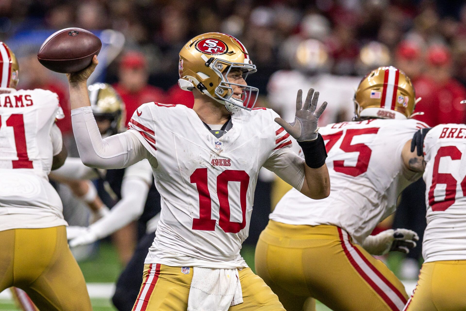 San Francisco 49ers quarterback Mac Jones (10) passes against the New Orleans Saints during the second half at Caesars Superdome.