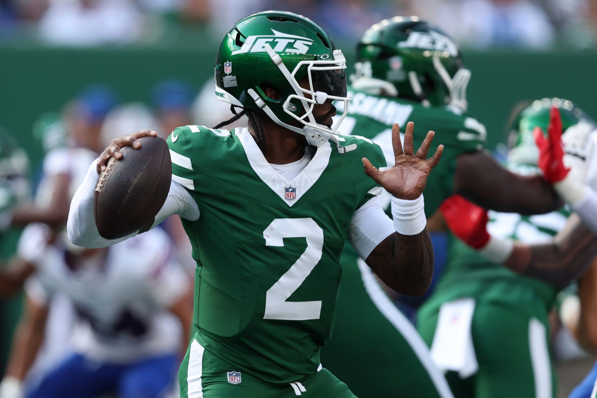 New York Jets quarterback Tyrod Taylor (2) drops back to pass against the Buffalo Bills during the second half at MetLife Stadium.