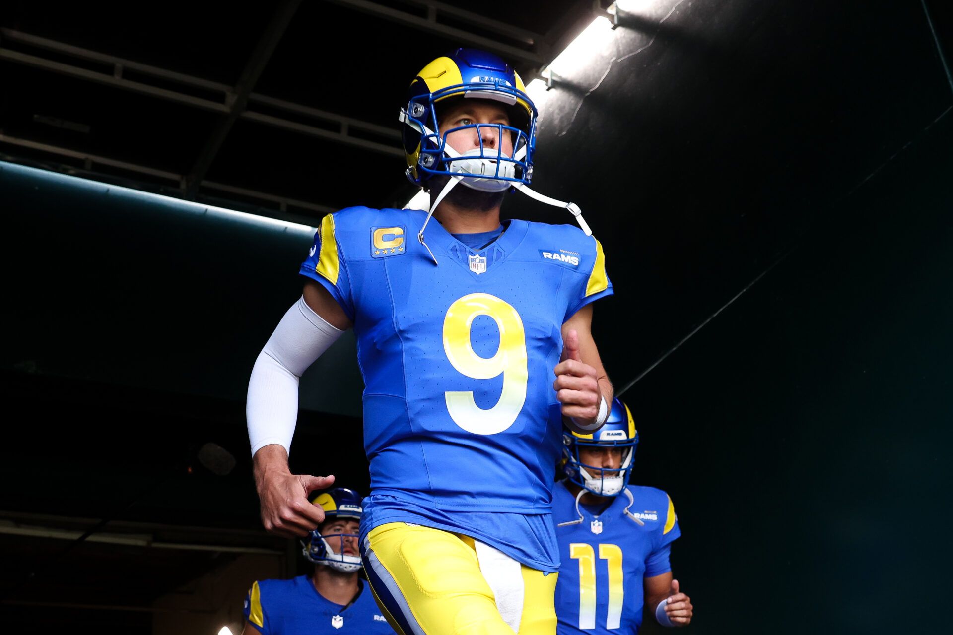 Los Angeles Rams quarterback Matthew Stafford (9) runs out of the tunnel for a game against the Philadelphia Eagles at Lincoln Financial Field.