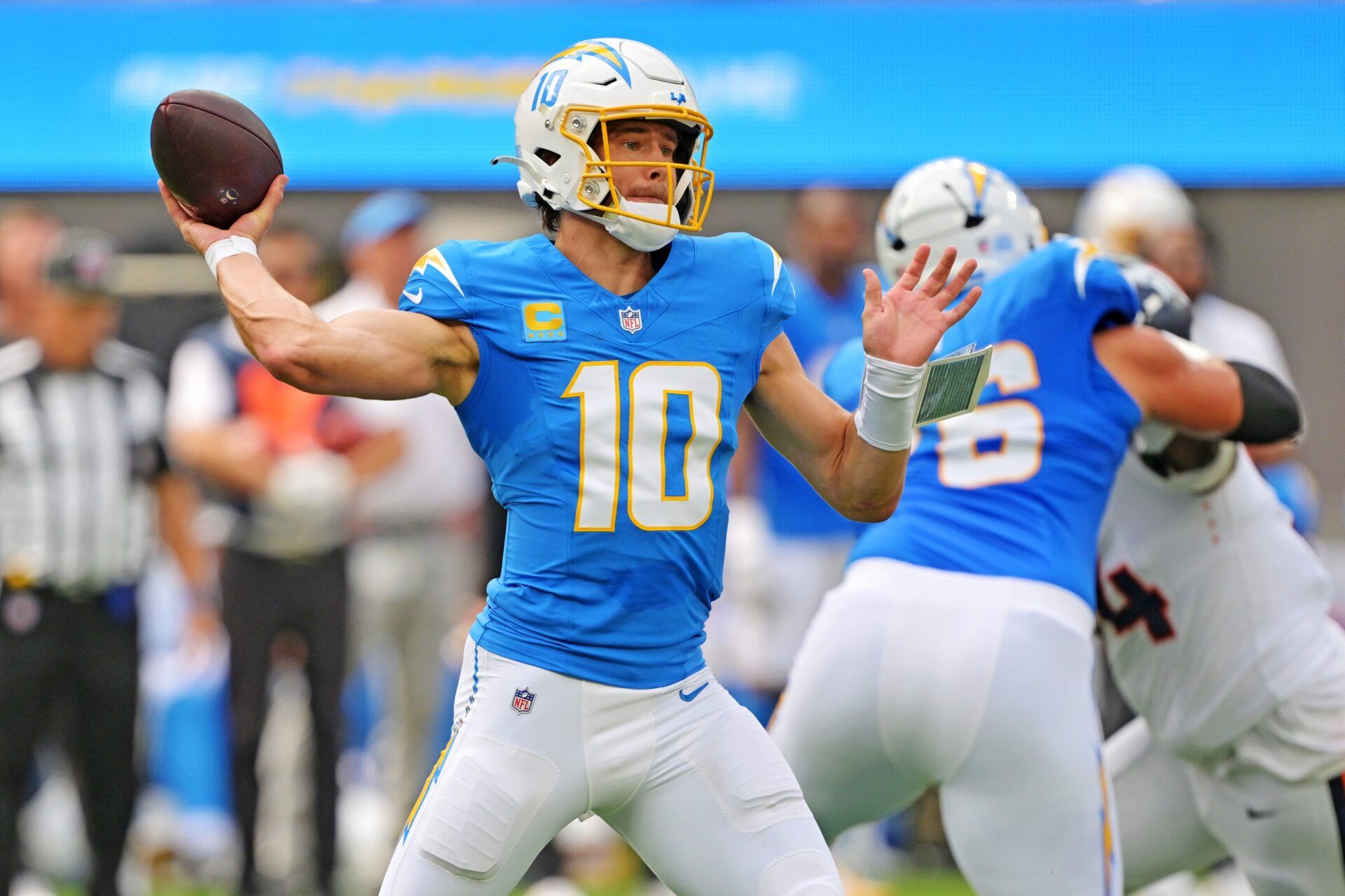 Los Angeles Chargers quarterback Justin Herbert (10) throws a pass during the first half against the Denver Broncos at SoFi Stadium.