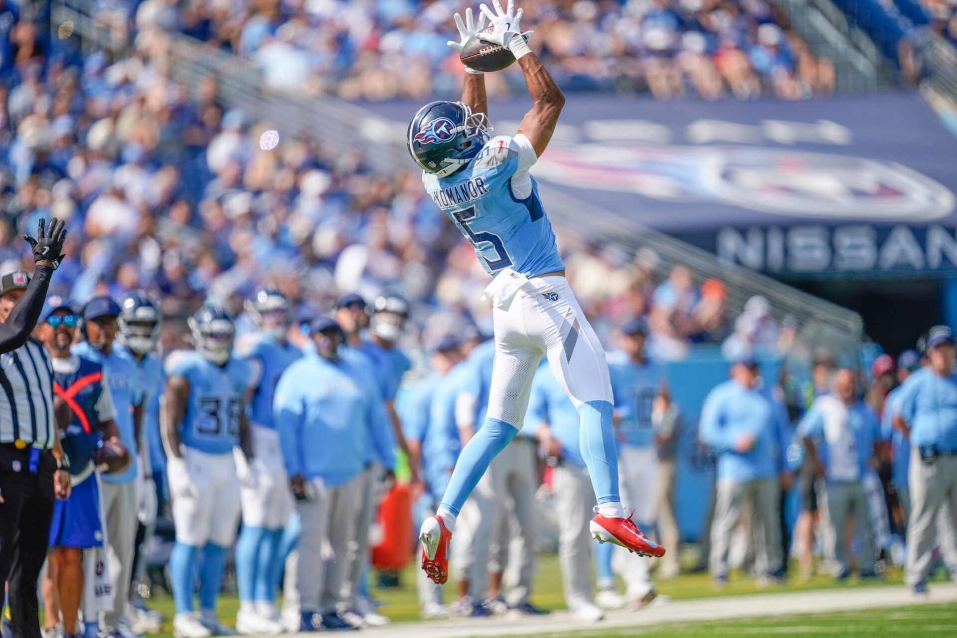 Tennessee Titans wide receiver Elic Ayomanor (5) receives a pass during the fourth quarter against the Indianapolis Colts  at Nissan Stadium.