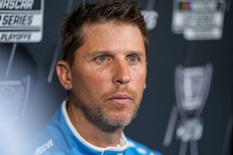 Denny Hamlin answers questions from the media  during NASCAR Cup Series Playoff Media Day at Charlotte Convention Center.
