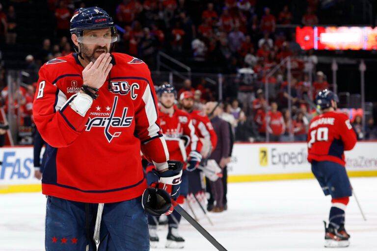 Washington Capitals left wing Alex Ovechkin (8) blows a kiss to his son in the stands after game five of the second round of the 2025 Stanley Cup Playoffs against the Carolina Hurricanes at Capital One Arena.