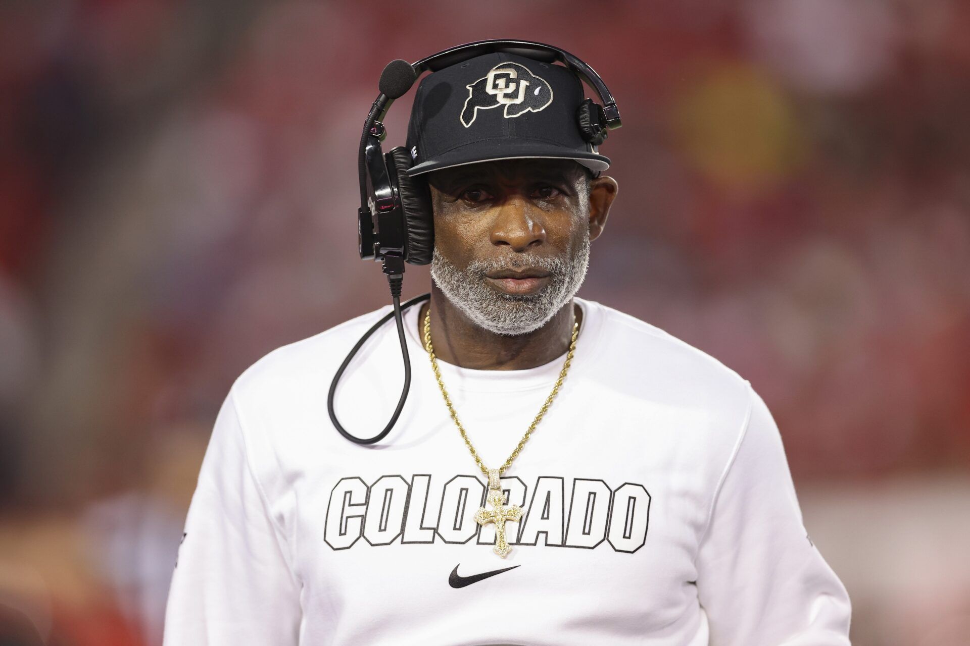 Colorado Buffaloes head coach Deion Sanders looks on from the sideline during the first half against the Houston Cougars at TDECU Stadium.