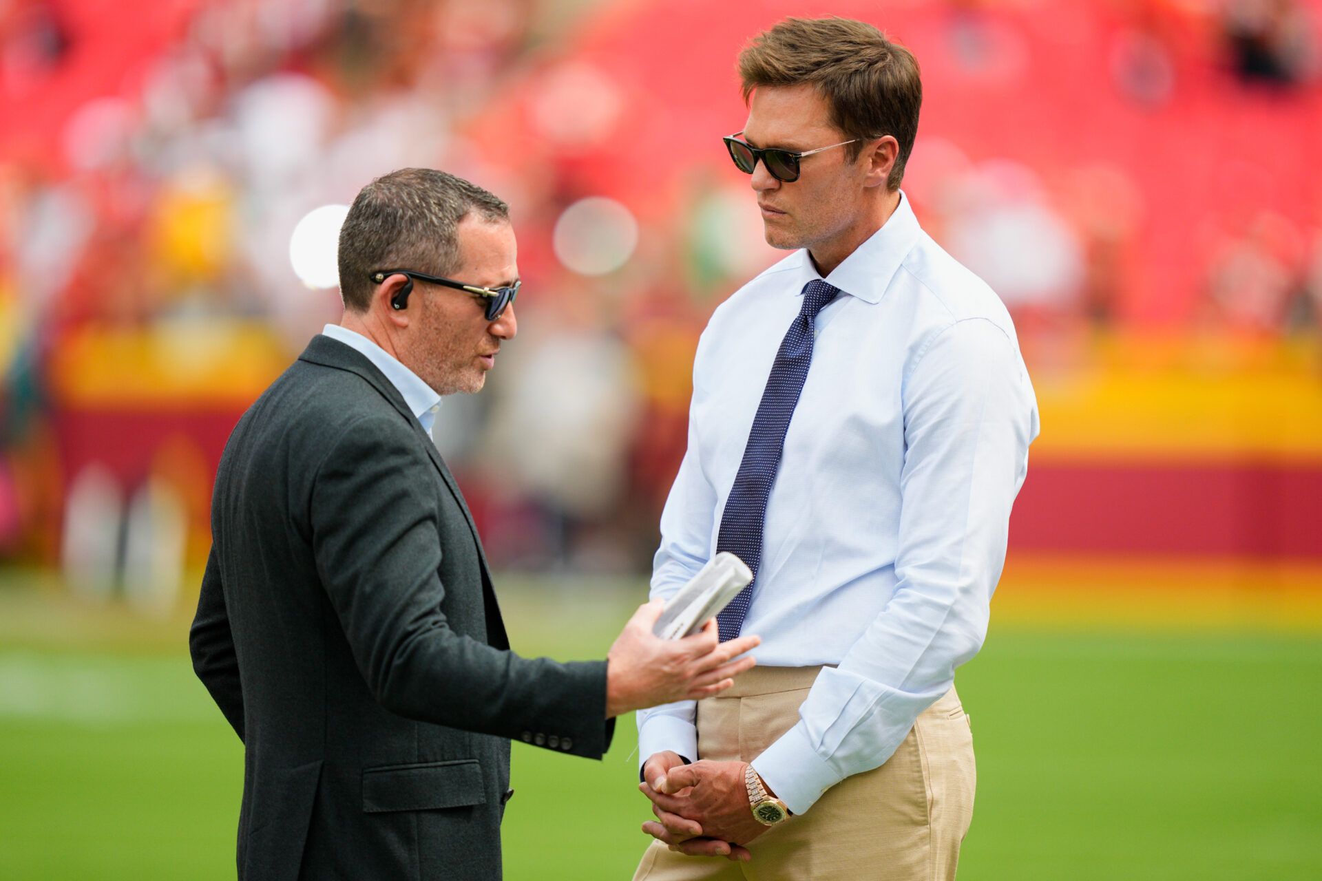 Philadelphia Eagles general manager Howie Roseman greets Fox Sports broadcaster Tom Brady prior to the game between the Kansas City Chiefs and the Philadelphia Eagles at GEHA Field at Arrowhead Stadium.