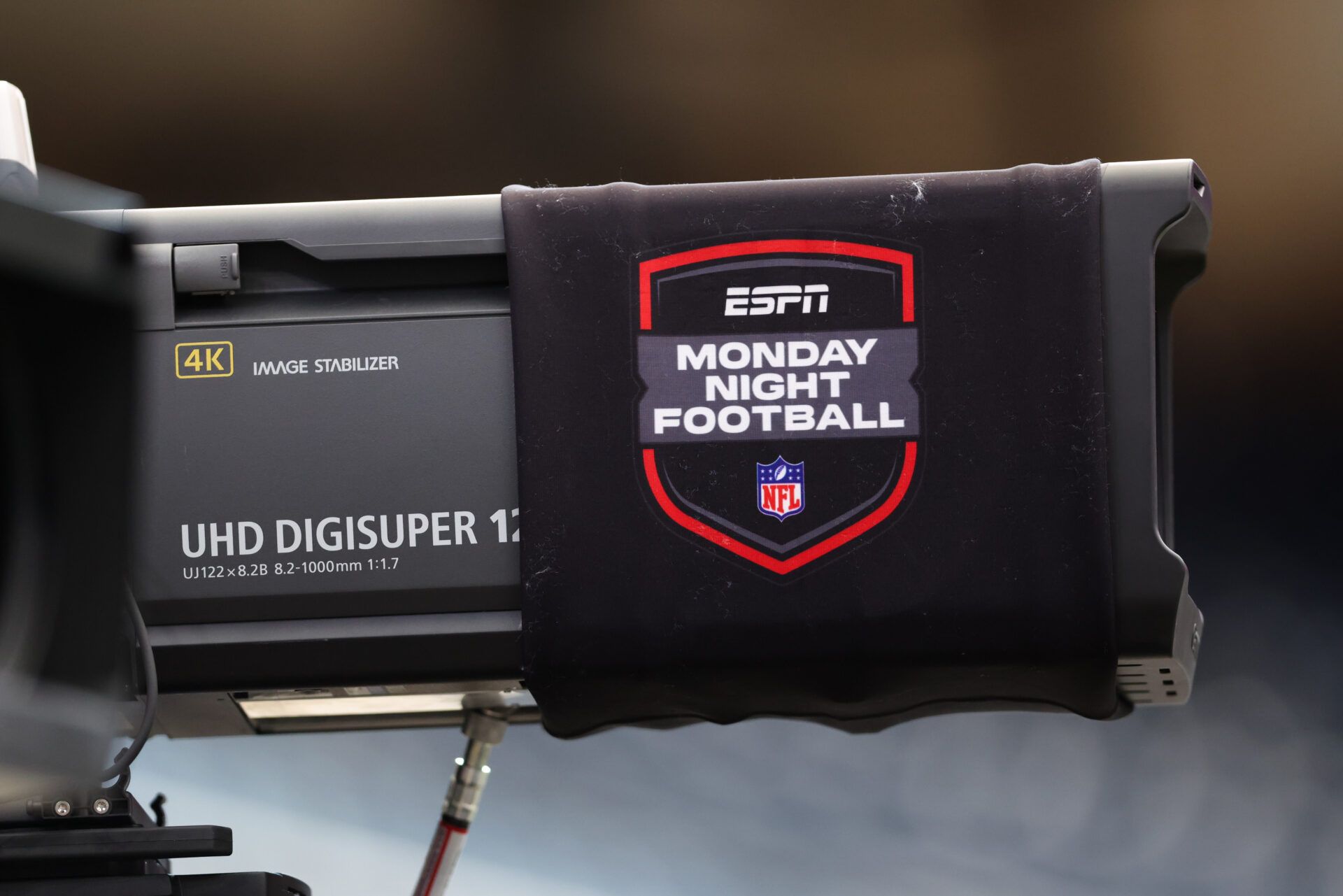 A broadcast camera is wrapped in a Monday Night Football logo before the game between the Houston Texans and the Tampa Bay Buccaneers at NRG Stadium.