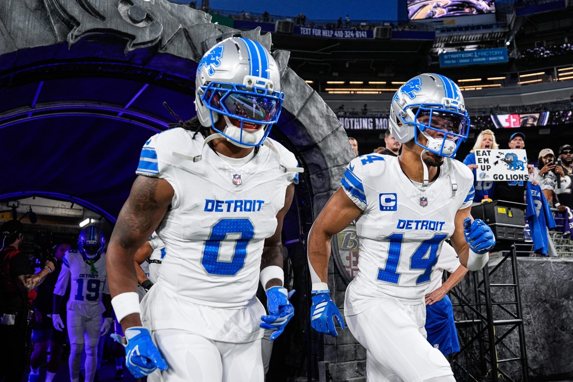 Detroit Lions running back Jahmyr Gibbs (0), left, and wide receiver Amon-Ra St. Brown (14) take the field for warm up ahead of game against Baltimore Ravens at M&T Bank Stadium in Baltimore, Md. on Monday, Sept. 22, 2025.