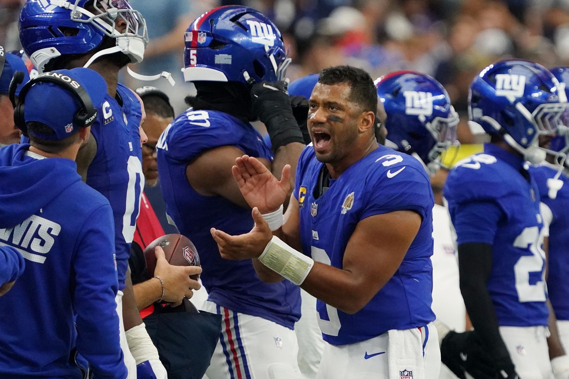 New York Giants quarterback Russell Wilson (3) claps after a play against the Dallas Cowboys during the fourth quarter at AT&T Stadium.