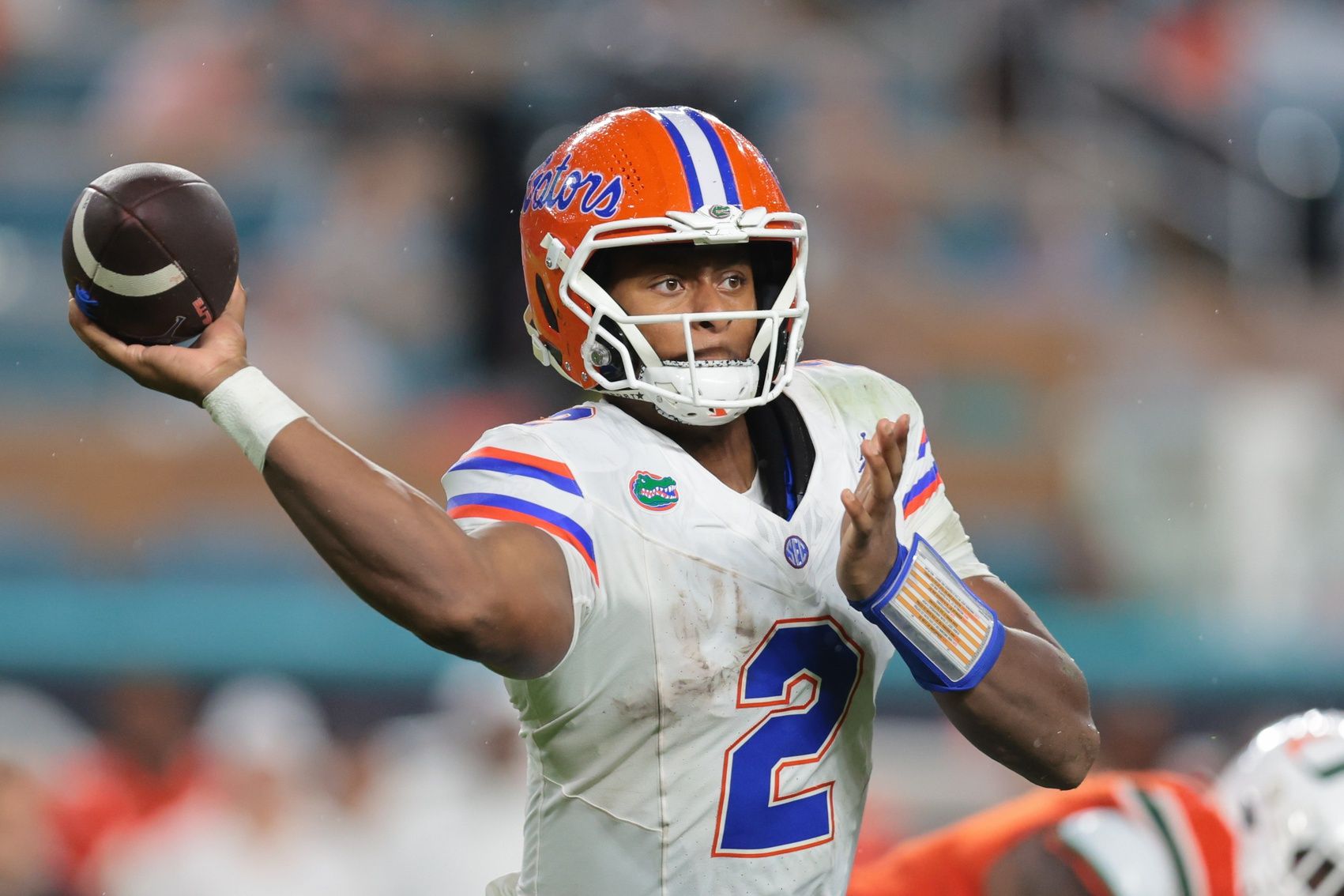 Florida Gators quarterback DJ Lagway (2) passes the football against the Miami Hurricanes during the second quarter at Hard Rock Stadium.