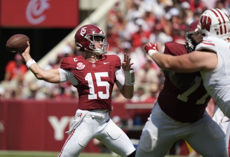 Alabama quarterback Ty Simpson (15) passes against Wisconsin at Saban Field at Bryant-Denny Stadium.