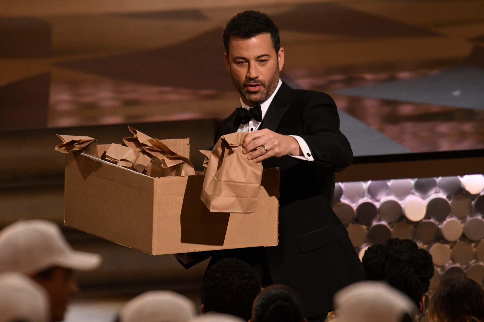 Jimmy Kimmel hands out snacks during 68th Emmy Awards at the Microsoft Theater on Sep. 18, 2016.