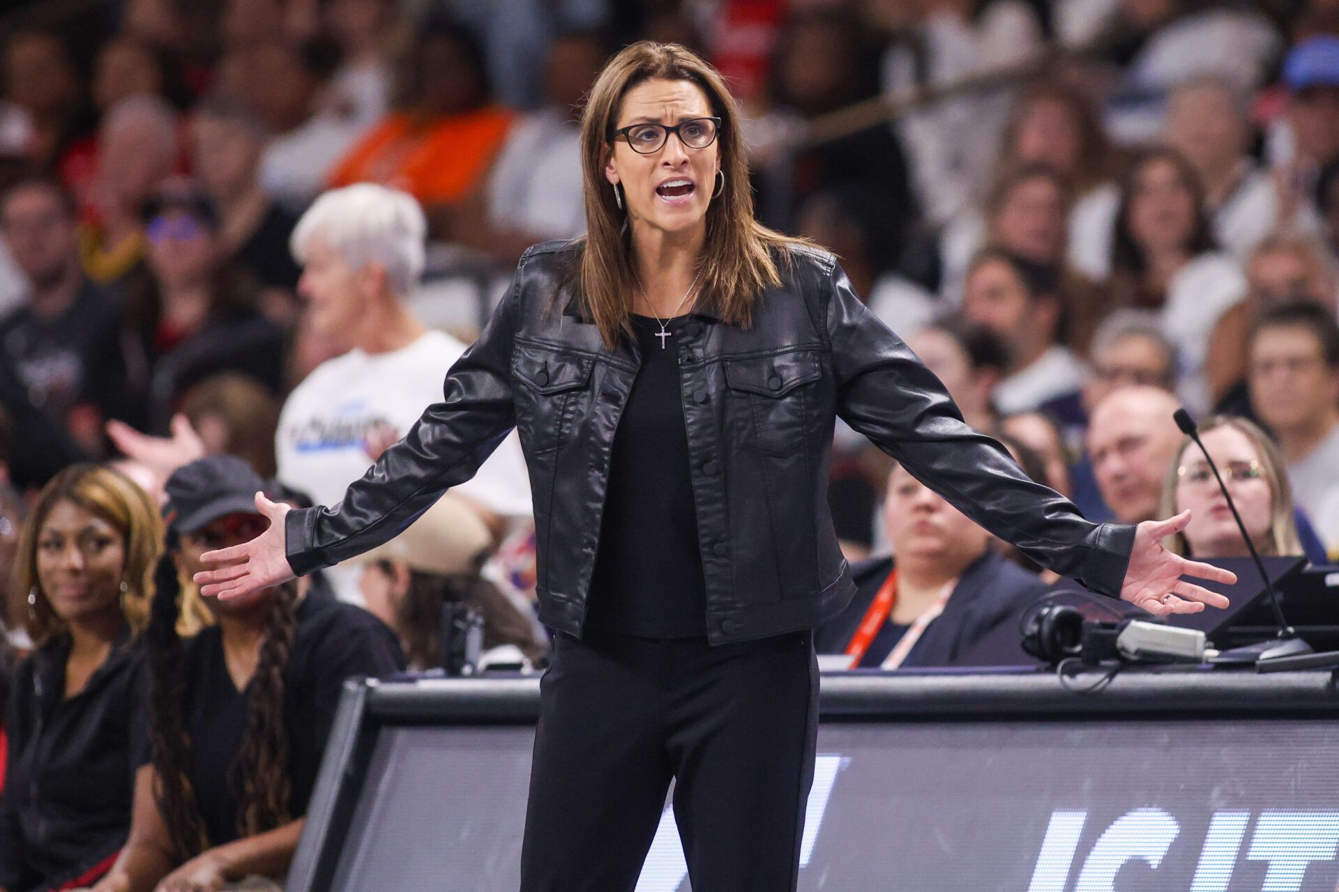 Indiana Fever head coach Stephanie White on the sideline against the Atlanta Dream in the second quarter during game one of round one for the 2025 WNBA Playoffs at Gateway Center Arena at College Park.