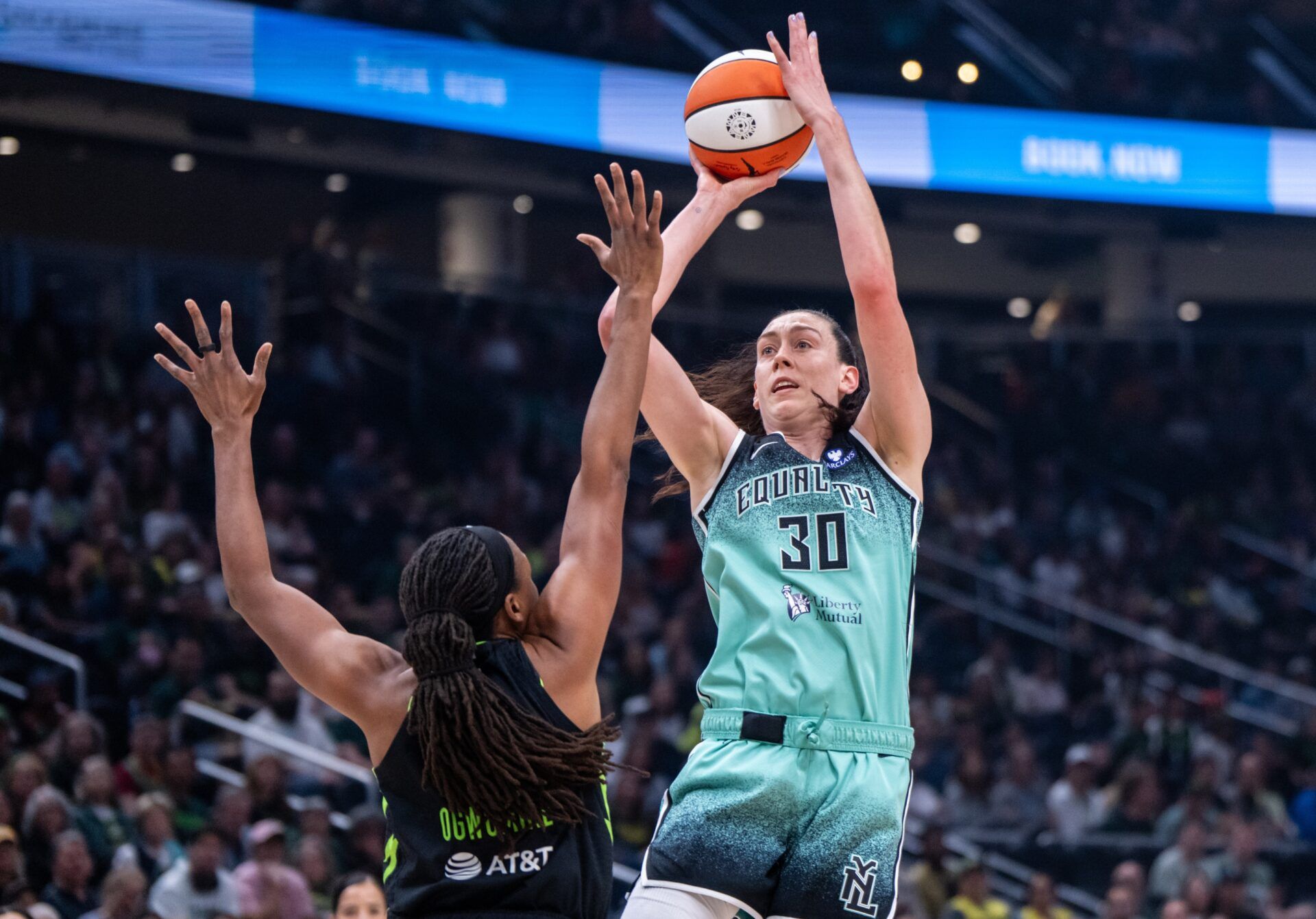 New York Liberty forward Breanna Stewart (30) shoots the ball against Seattle Storm forward Nneka Ogwumike (3) during the first half at Climate Pledge Arena.