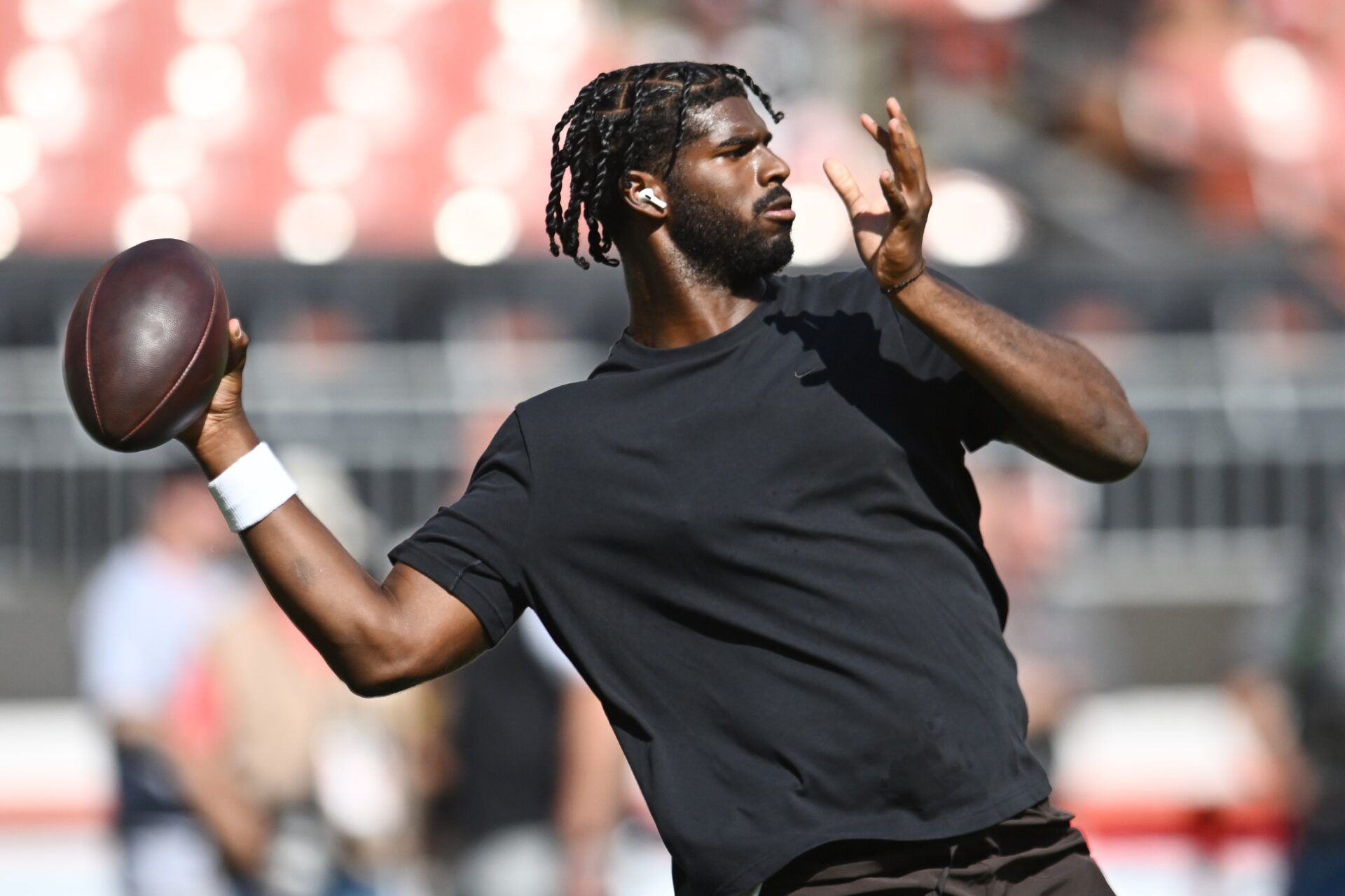 Cleveland Browns quarterback Shedeur Sanders (12) warms up before the game between the Browns and the Green Bay Packers at Huntington Bank Field.