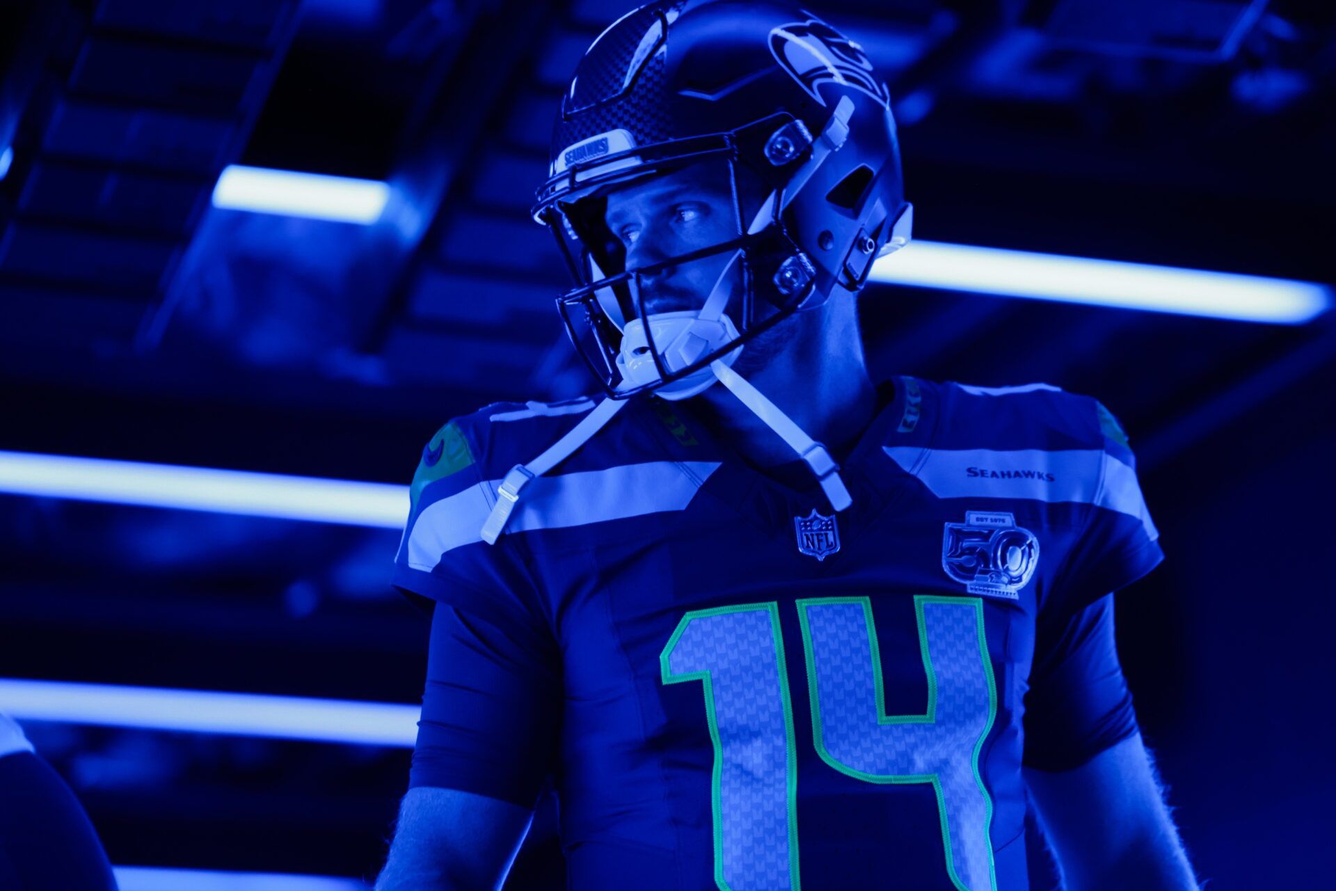 Seattle Seahawks quarterback Sam Darnold (14) enters the field before the game against the New Orleans Saints at Lumen Field.