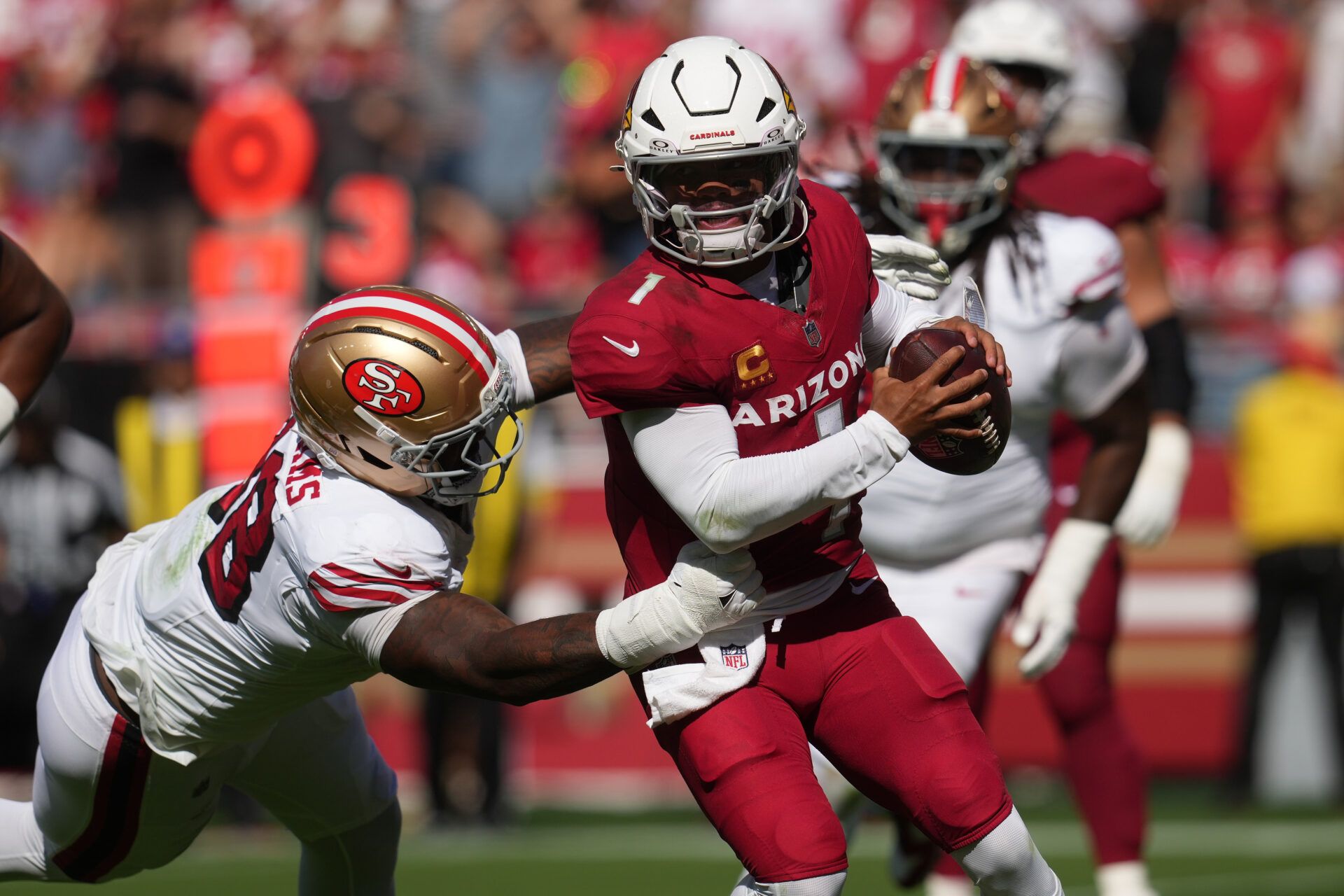 Arizona Cardinals quarterback Kyler Murray (1) is pressured by San Francisco 49ers defensive end Mykel Williams (98) during the second half at Levi's Stadium.