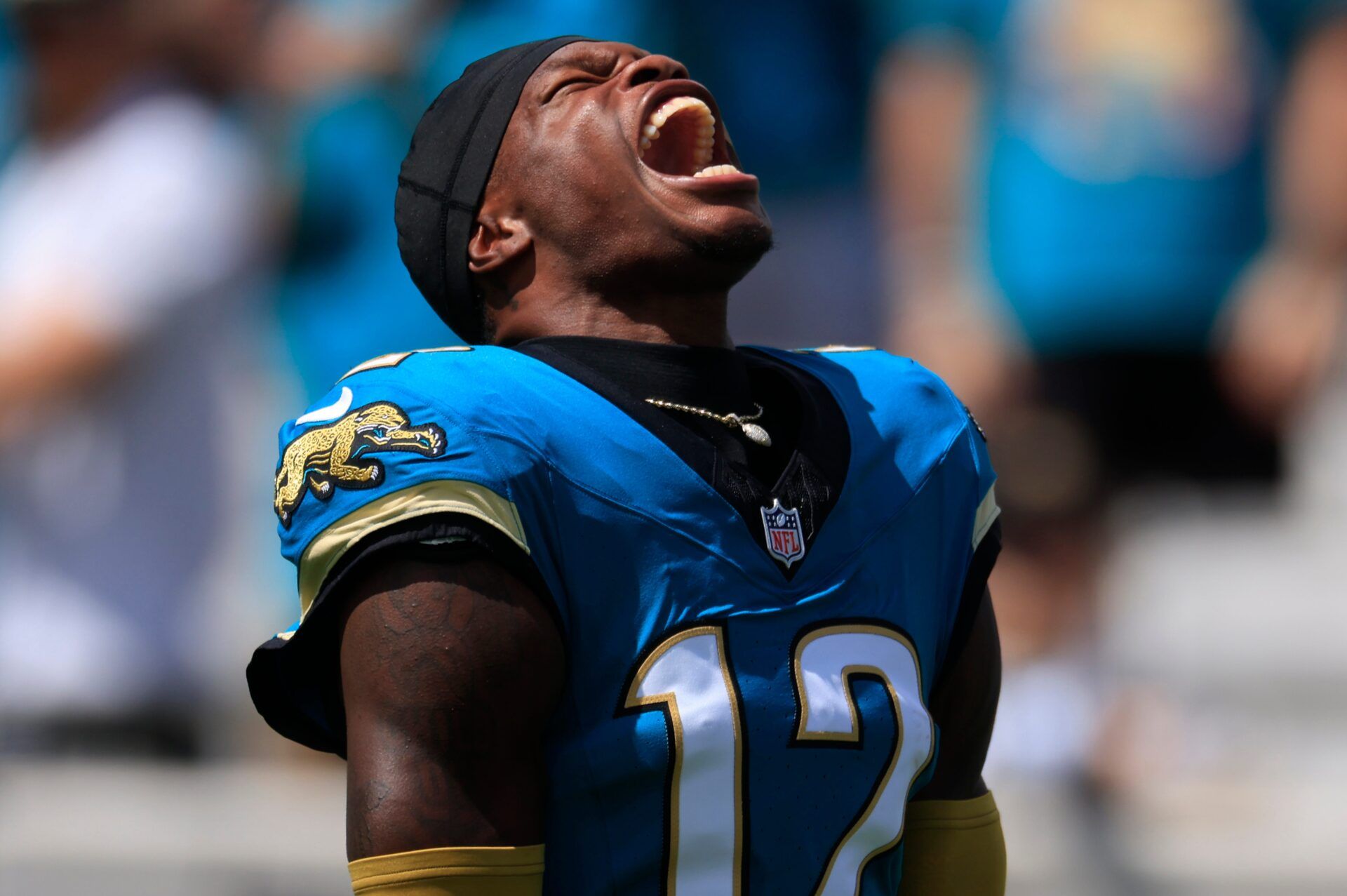 Jacksonville Jaguars wide receiver Travis Hunter (12) lets out a yell as he is introduced before an NFL football matchup at EverBank Stadium, Sunday, Sept. 21, 2025, in Jacksonville, Fla. The Jaguars defeated the Texans 17-10. The Jaguars defeated the Texans 17-10.