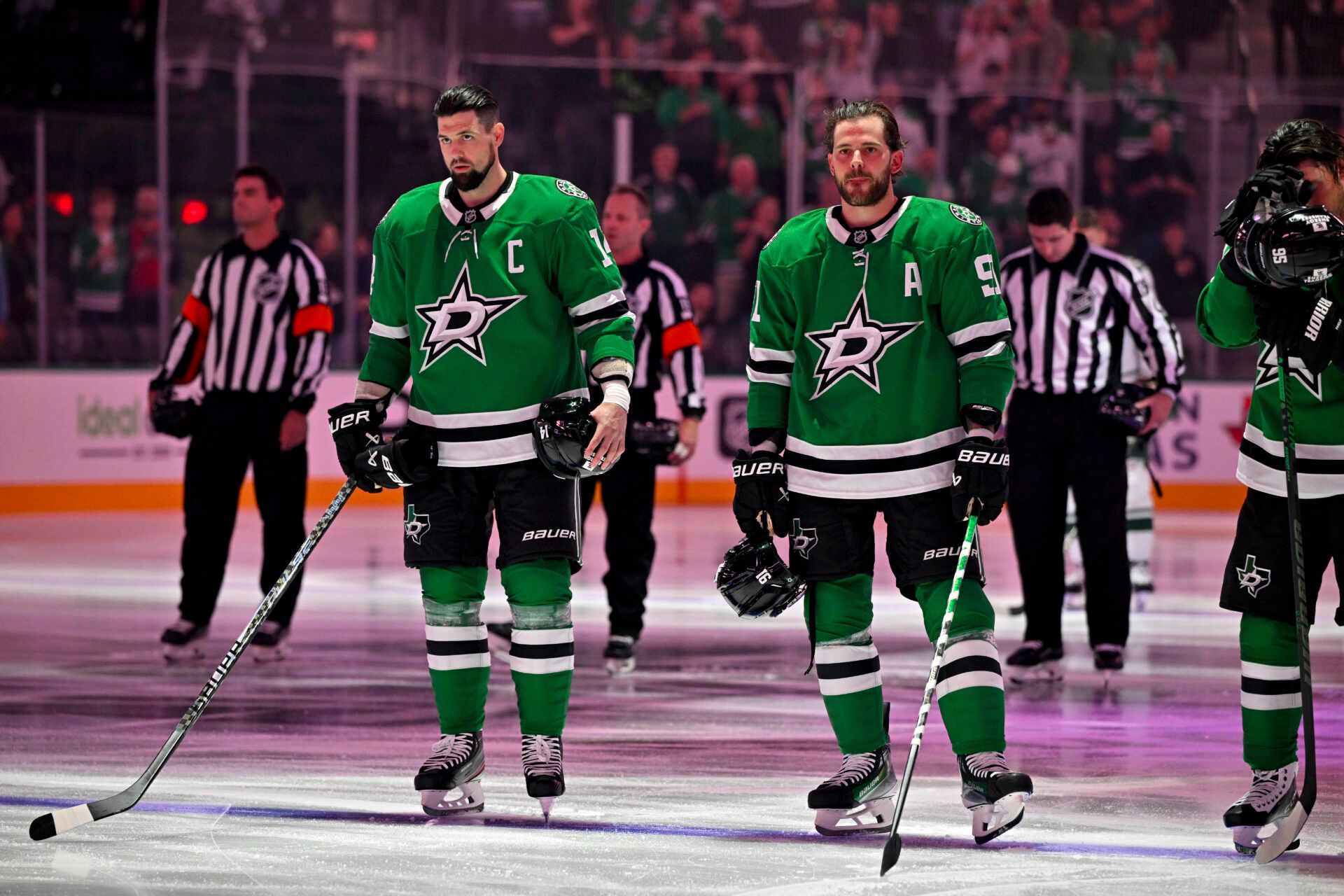 Dallas Stars left wing Jamie Benn (14) and center Tyler Seguin (91) look on before the game against the Minnesota Wild at American Airlines Center.