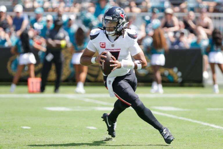 Houston Texans quarterback C.J. Stroud (7) runs with the ball during the second quarter against the Jacksonville Jaguars at EverBank Stadium.